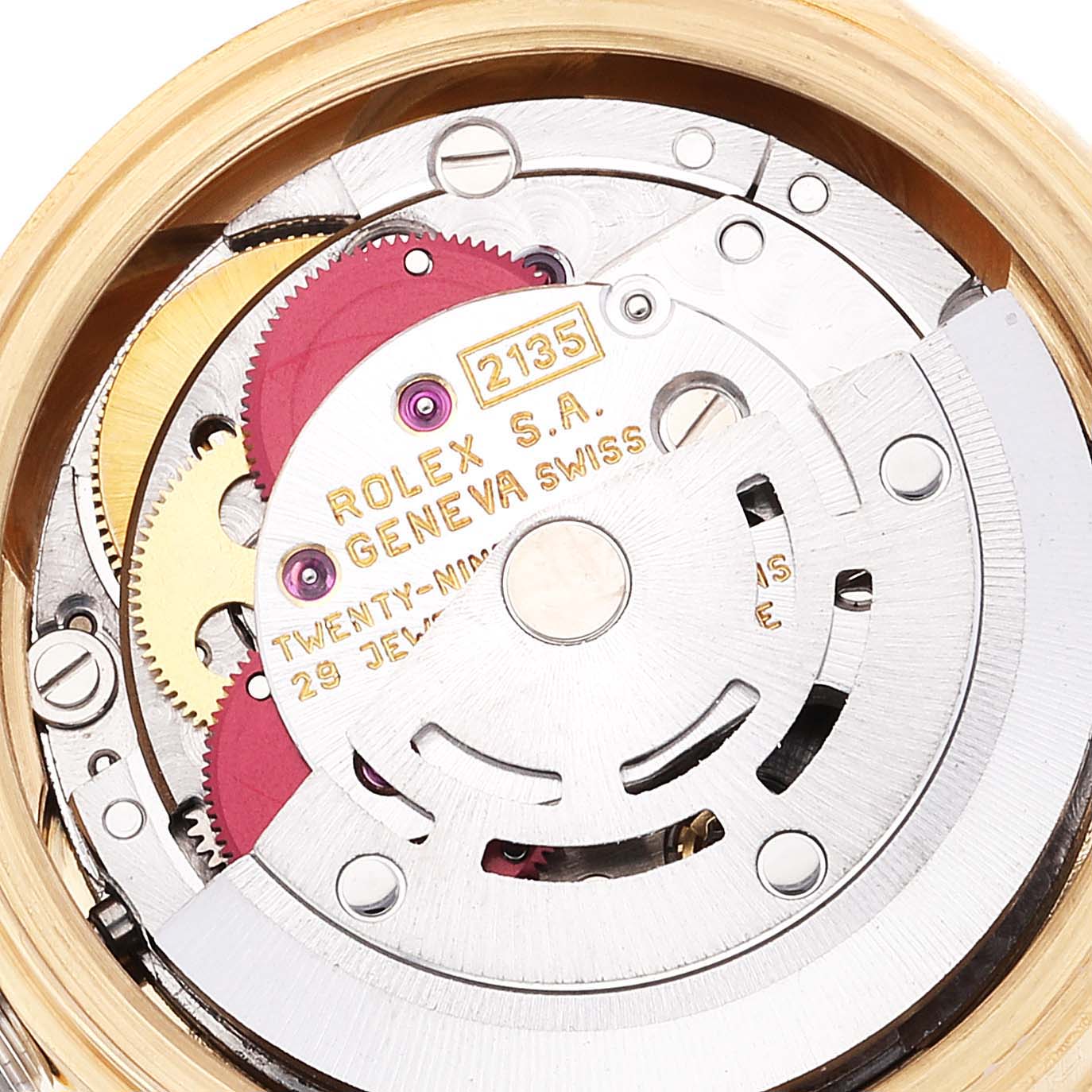 The image shows the internal mechanism of a Rolex President 69178 Women's Yellow Gold Champagne Dial 69178 Women's Yellow Gold Champagne Dial model, including gears, jewels, and the rotor from an angled view.