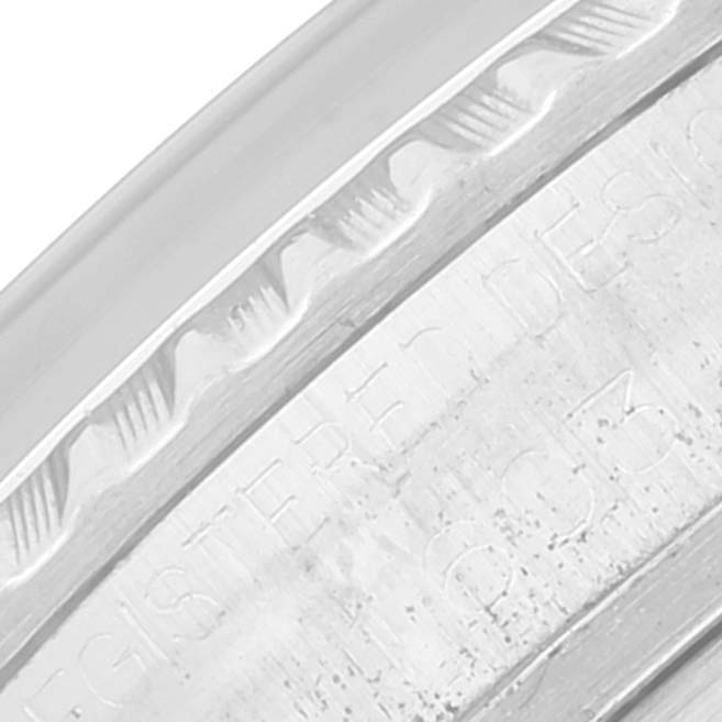 The close-up image shows the engraved bezel of a Rolex Vintage Collection 1603 Men's Stainless Steel Silver Dial 1603 Men's Stainless Steel Silver Dial model watch with detailed markings.