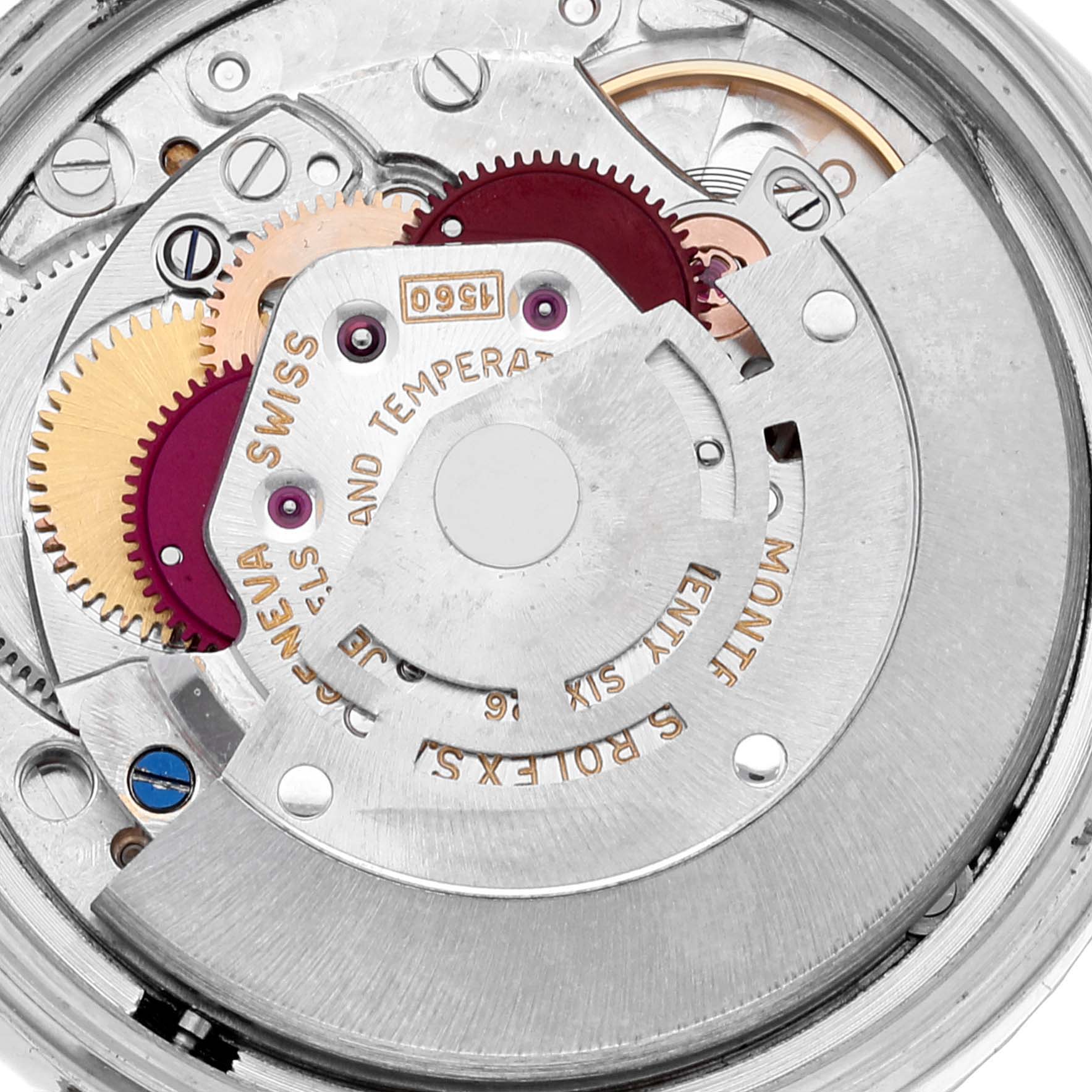 This image shows the movement mechanism of a Vintage Collection Rolex watch, highlighting gears and intricate parts.