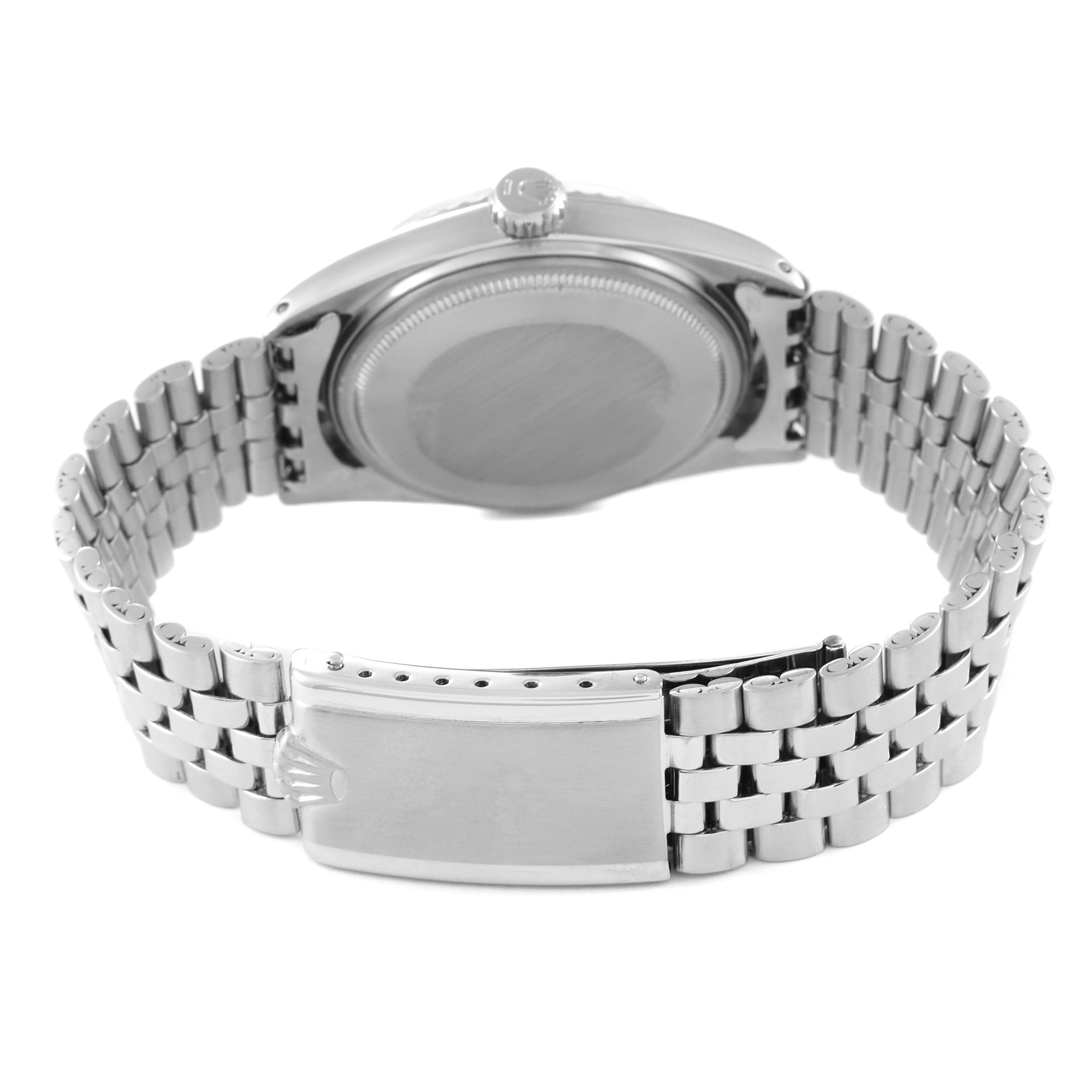 The image shows the back view of a Rolex Vintage Collection 1603 Men's Stainless Steel Silver Dial 1603 Men's Stainless Steel Silver Dial watch, highlighting the case back, crown, and metal bracelet with clasp.