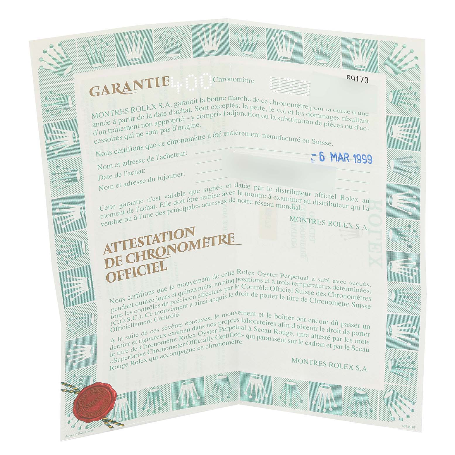 This image shows the warranty certificate and chronometer certification for the Rolex Datejust 69173 Women's Steel and Gold (two tone) Champagne Dial 69173 Women's Steel and Gold (two tone) Champagne Dial model.