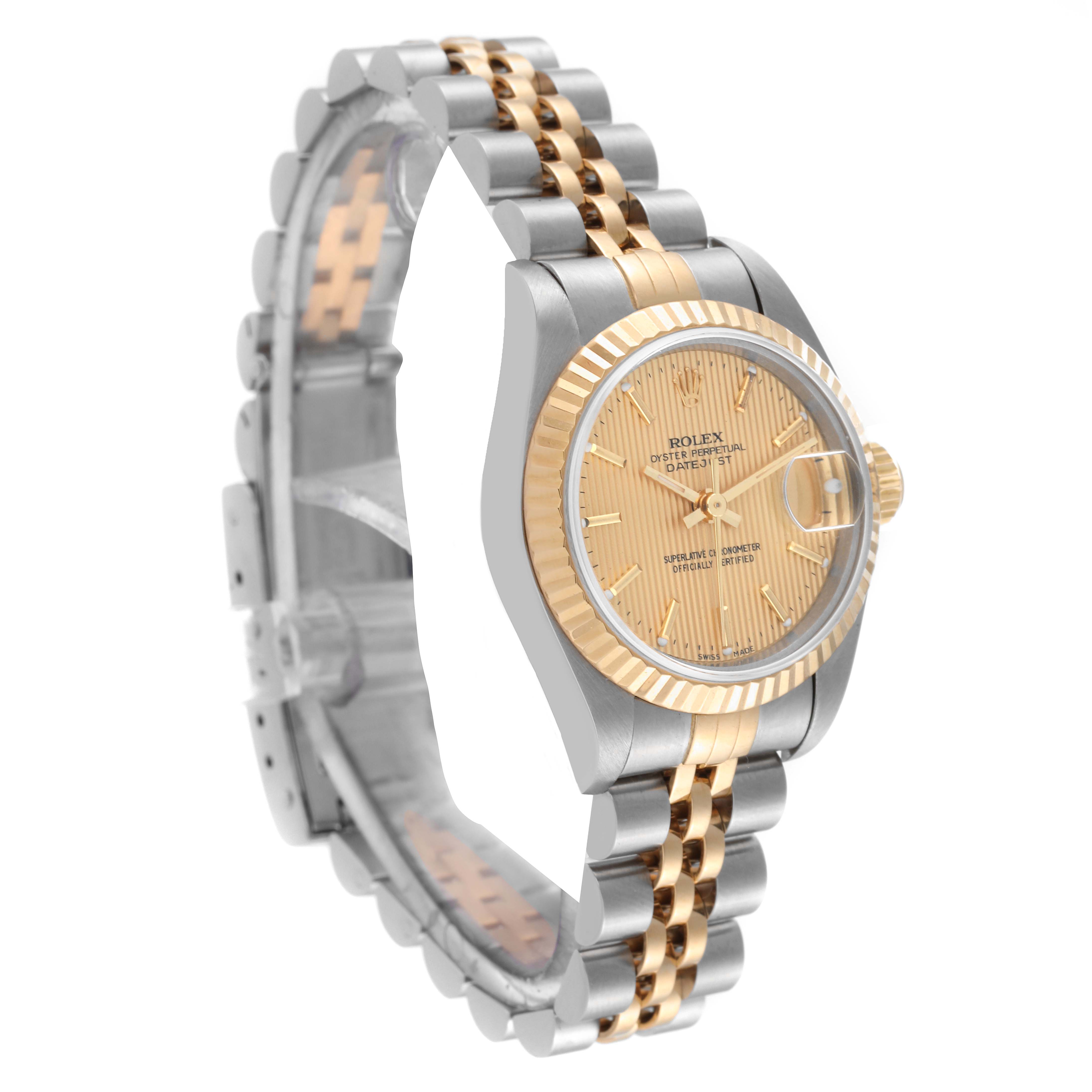 The image shows a Rolex Datejust 69173 Women's Steel and Gold (two tone) Champagne Dial 69173 Women's Steel and Gold (two tone) Champagne Dial watch from a slight side angle, highlighting its face, bezel, and two-tone bracelet.