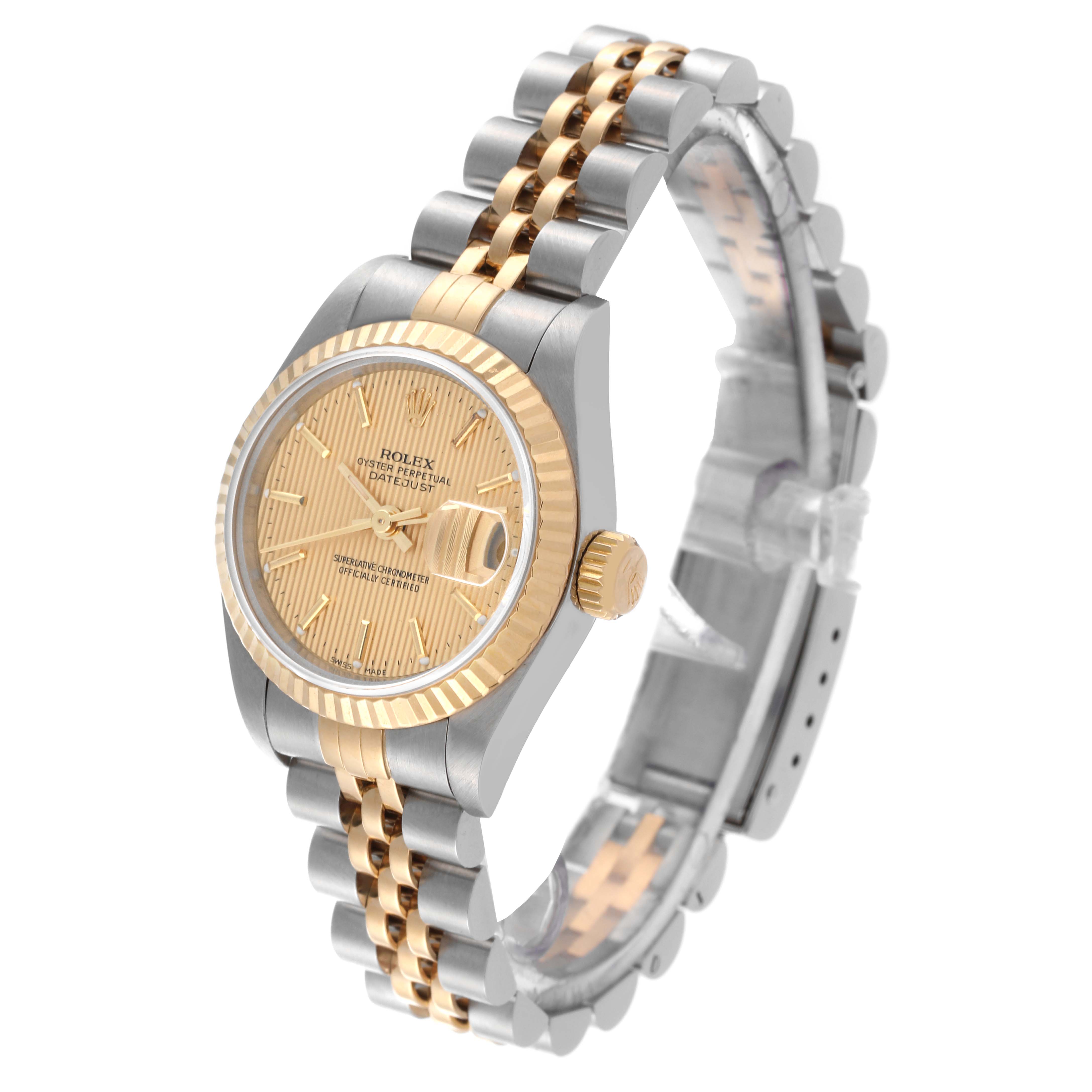 The image shows a Rolex Datejust 69173 Women's Steel and Gold (two tone) Champagne Dial 69173 Women's Steel and Gold (two tone) Champagne Dial watch at a three-quarter angle, highlighting its dial, bezel, crown, and two-tone bracelet.