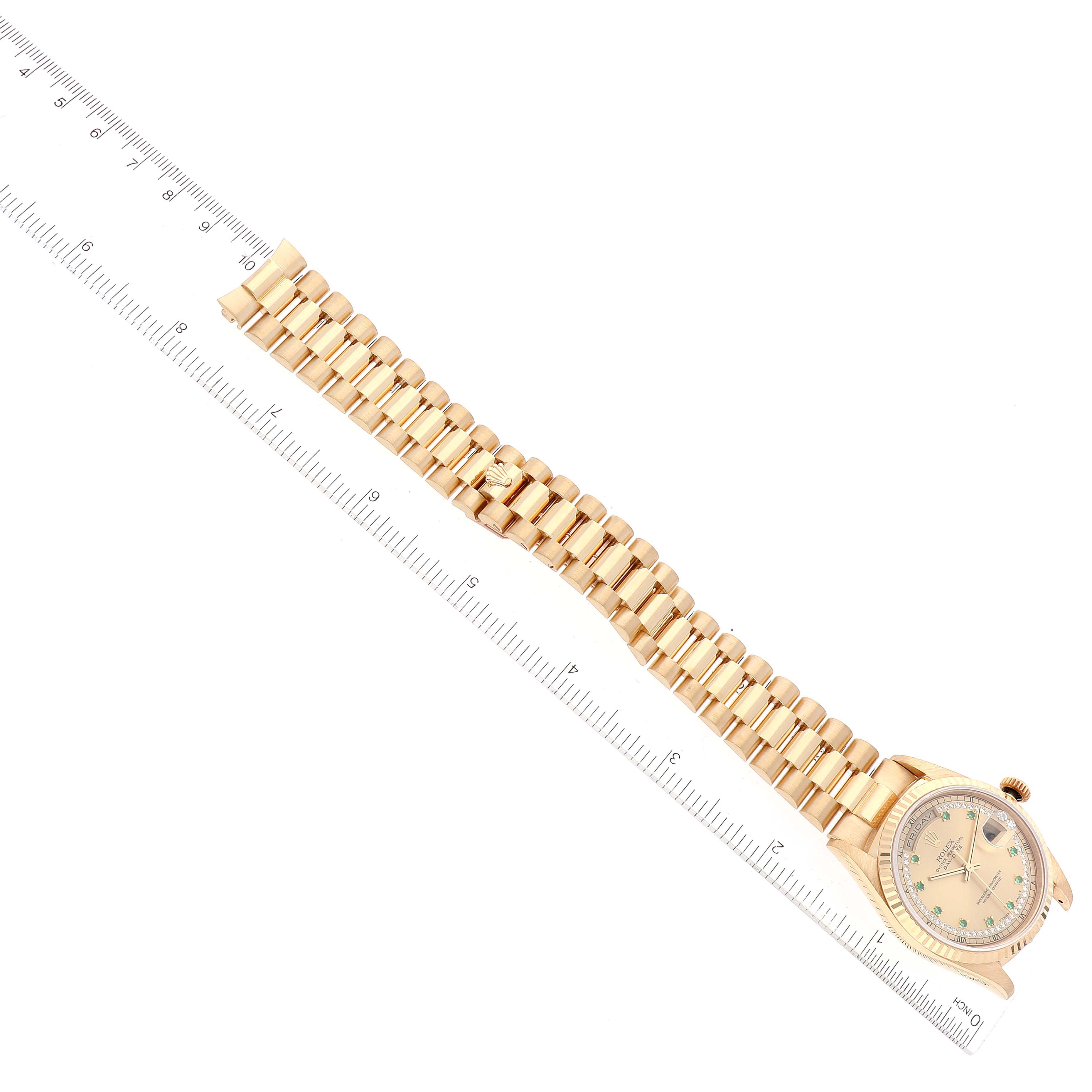 The Rolex President 18238 Men
s Yellow Gold Champagne Dial 18238 Men
s Yellow Gold Champagne Dial model watch is displayed flat, showing the gold bracelet and face alongside a ruler for scale.