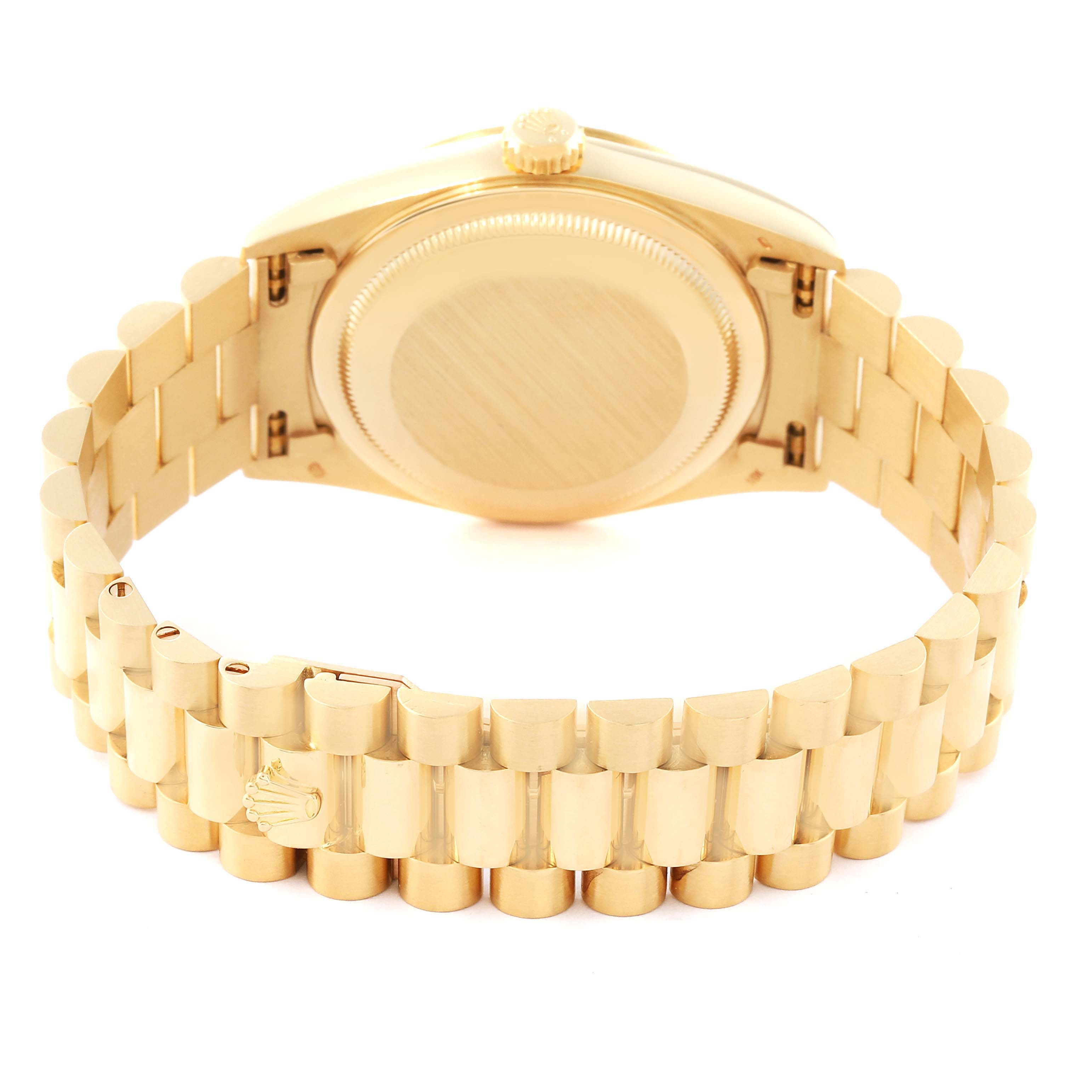 This image shows the back case and bracelet of a Rolex President 18238 Men
s Yellow Gold Champagne Dial 18238 Men
s Yellow Gold Champagne Dial model watch.