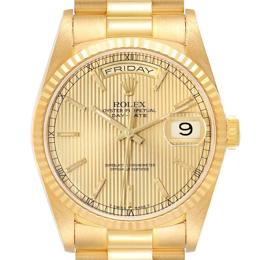 This is a front view of the Rolex President model watch, showcasing its gold case, fluted bezel, dial, and bracelet.