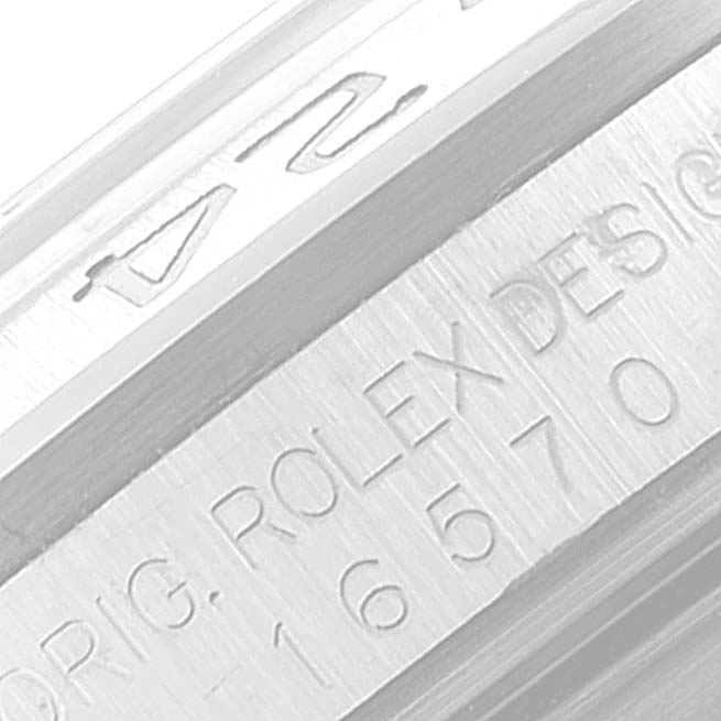 The image shows a close-up angle of the engraved bezel and case of a Rolex Explorer 16570 Men
s Stainless Steel Black Dial 16570 Men
s Stainless Steel Black Dial watch.