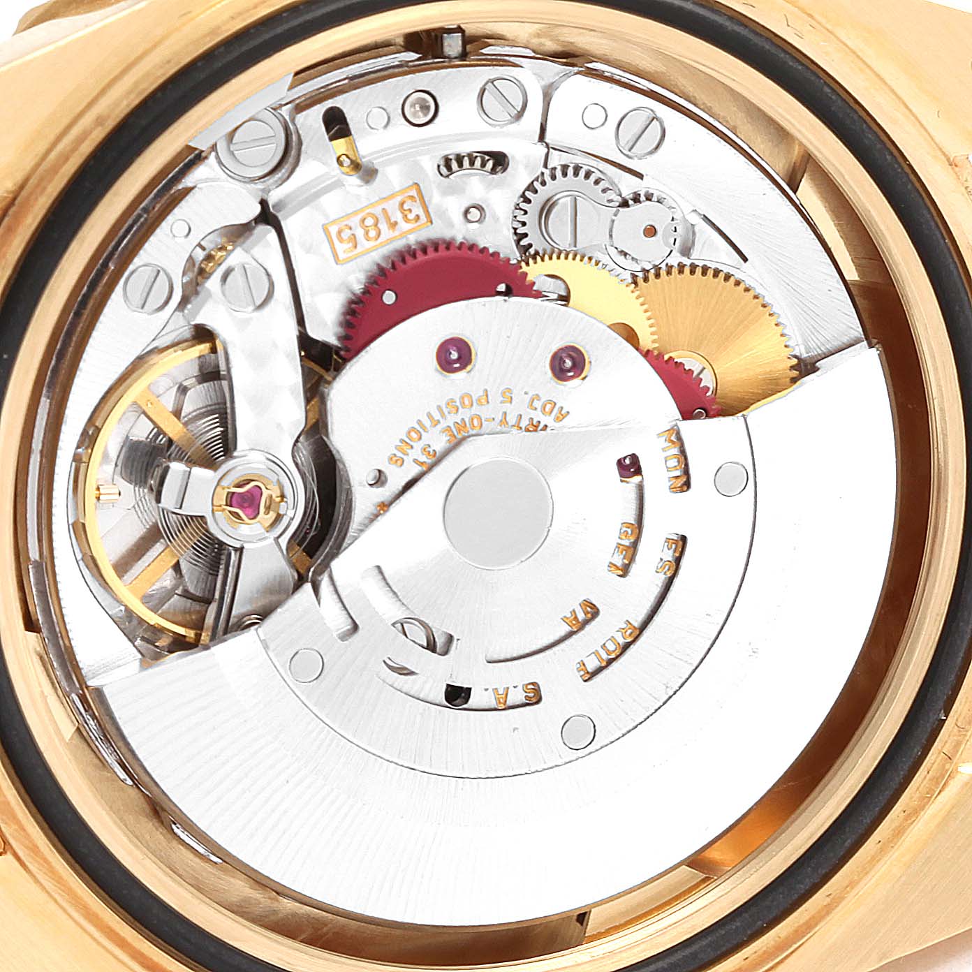This image shows the movement and inner mechanical parts of a Rolex GMT-Master 16718 Men's Yellow Gold Black Dial 16718 Men's Yellow Gold Black Dial watch from a close-up angle.