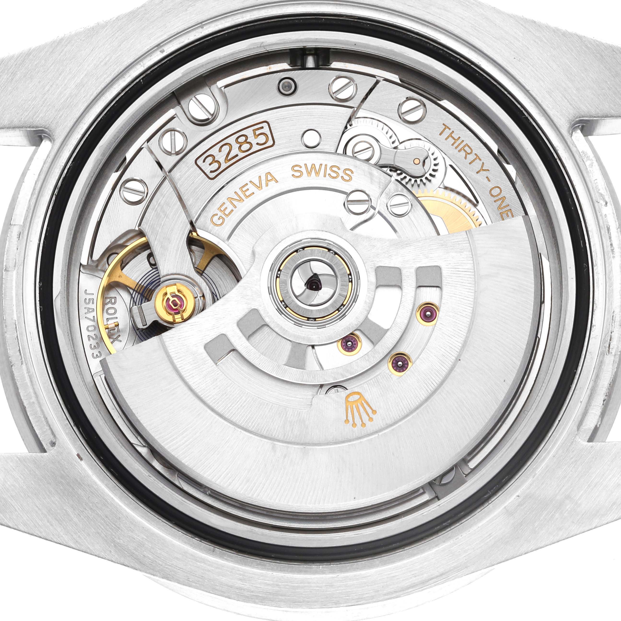 This is the movement of a Rolex GMT-Master 126710BLNR Men
s Stainless Steel Black Dial 126710BLNR Men
s Stainless Steel Black Dial watch, viewed from the back, showing the mechanism and components like the rotor and balance wheel.