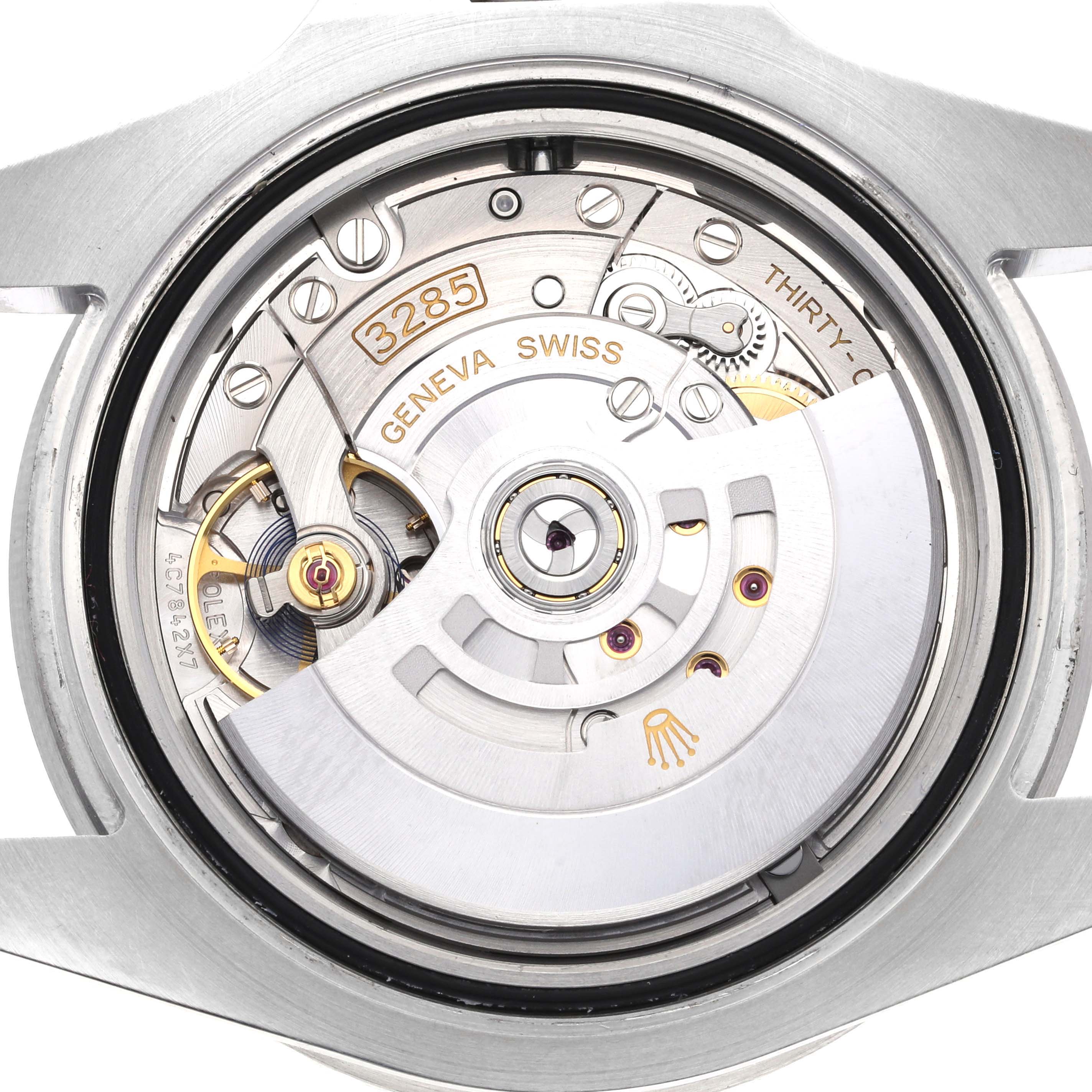 Close-up of the Rolex GMT-Master 126710BLRO Men
s Stainless Steel Black Dial 126710BLRO Men
s Stainless Steel Black Dial model showing the internal movement and components, including the rotor and balance wheel.