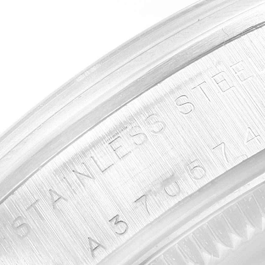 This image shows a close-up angle of the stainless steel caseback edge on a Mid-Size Rolex watch.