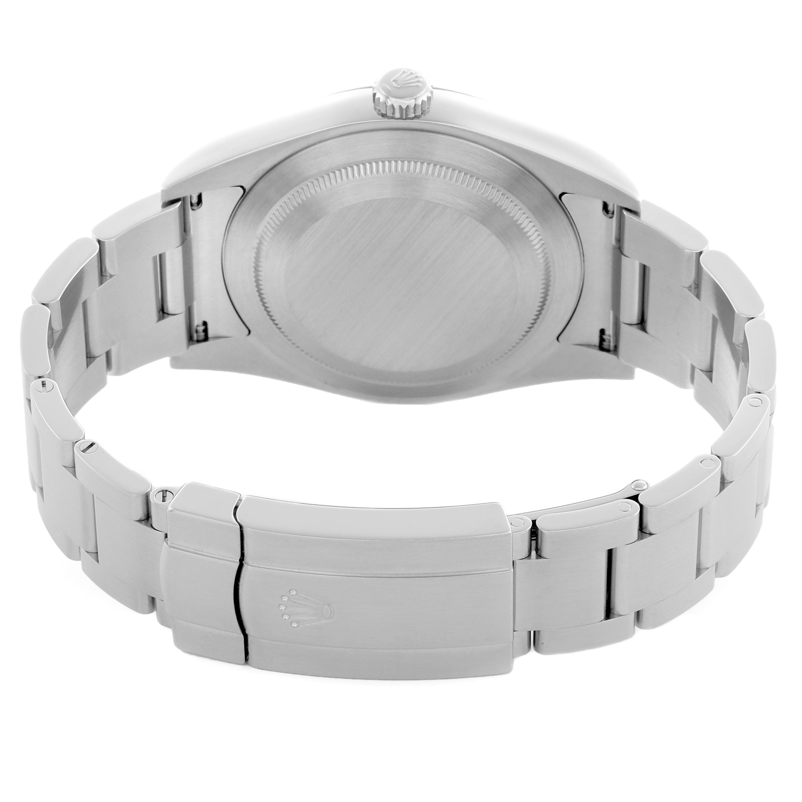 The image shows the back and clasp of the Rolex Oyster Perpetual 114300 Men
s Stainless Steel Grey Dial 114300 Men
s Stainless Steel Grey Dial, focusing on the bracelet and case back.