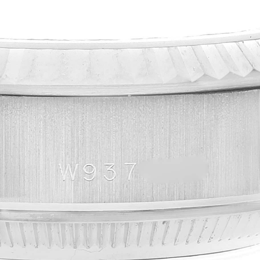 This image shows a close-up of the case side with a partial view of the bezel featuring a model number for the Rolex President 69179 Women's White Gold Silver Dial 69179 Women's White Gold Silver Dial watch.