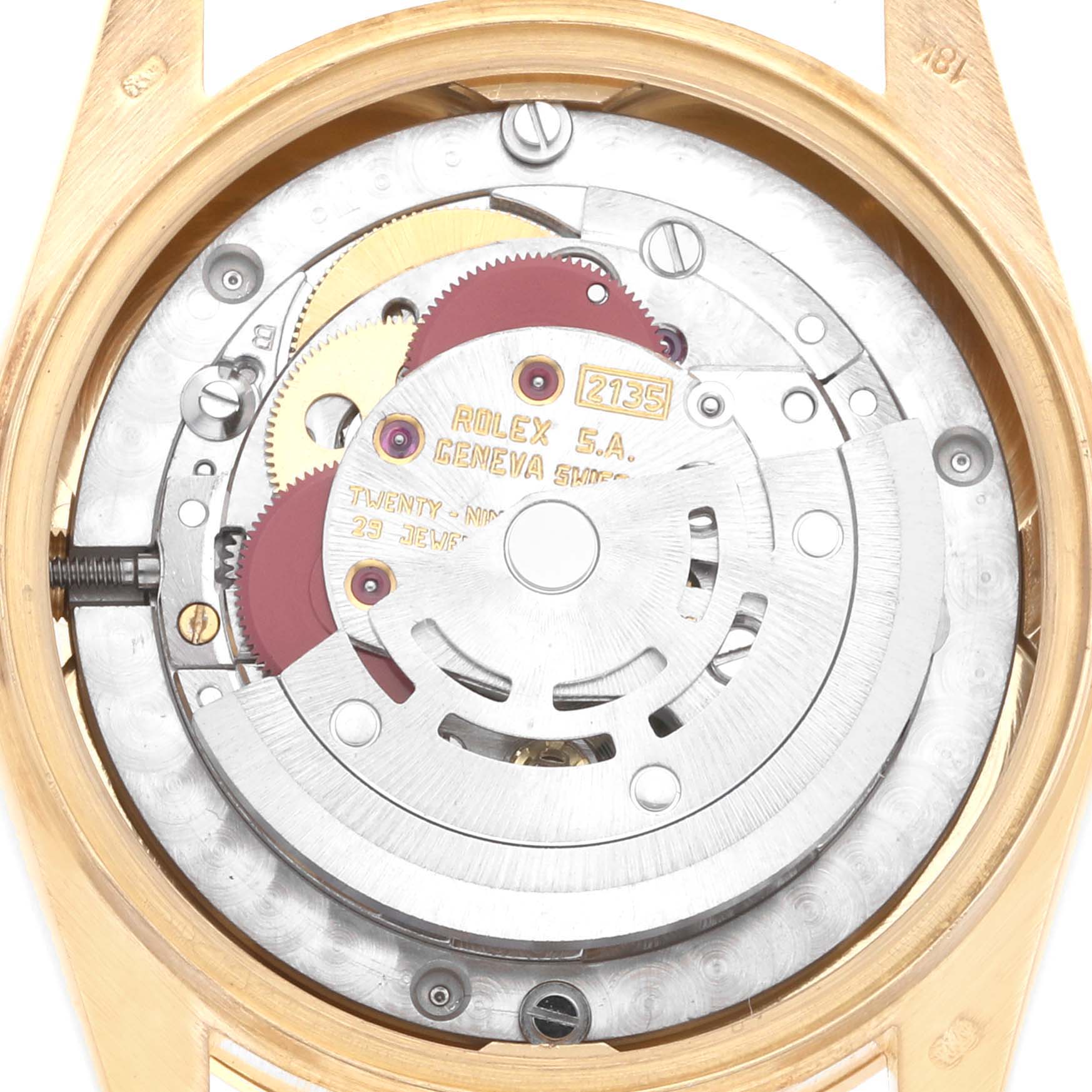 The image shows the internal mechanisms of a Rolex President 68258 Women's Yellow Gold Silver Dial 68258 Women's Yellow Gold Silver Dial model watch from a top-down angle.