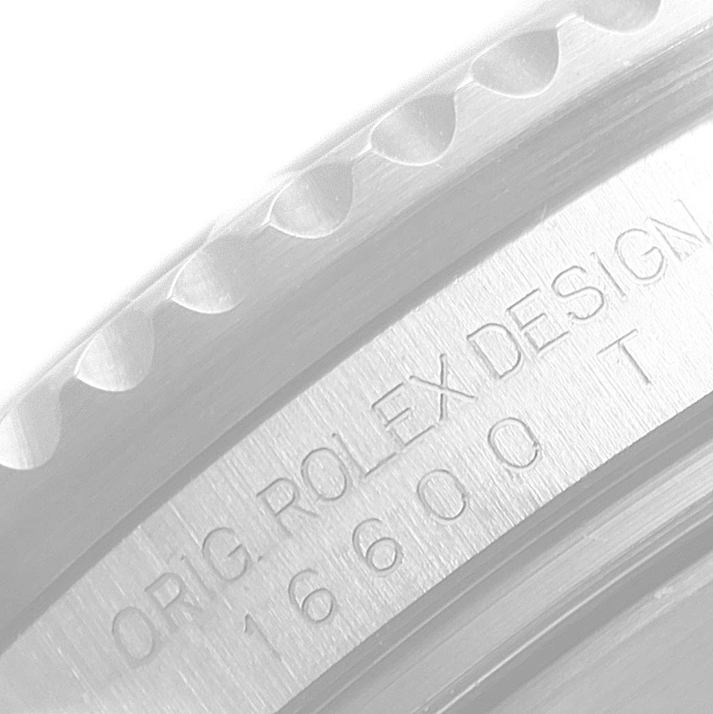 This image shows a close-up view of the engraving on the bezel and case of the Rolex Sea-Dweller 16600 Men
s Stainless Steel Black Dial 16600 Men
s Stainless Steel Black Dial model.