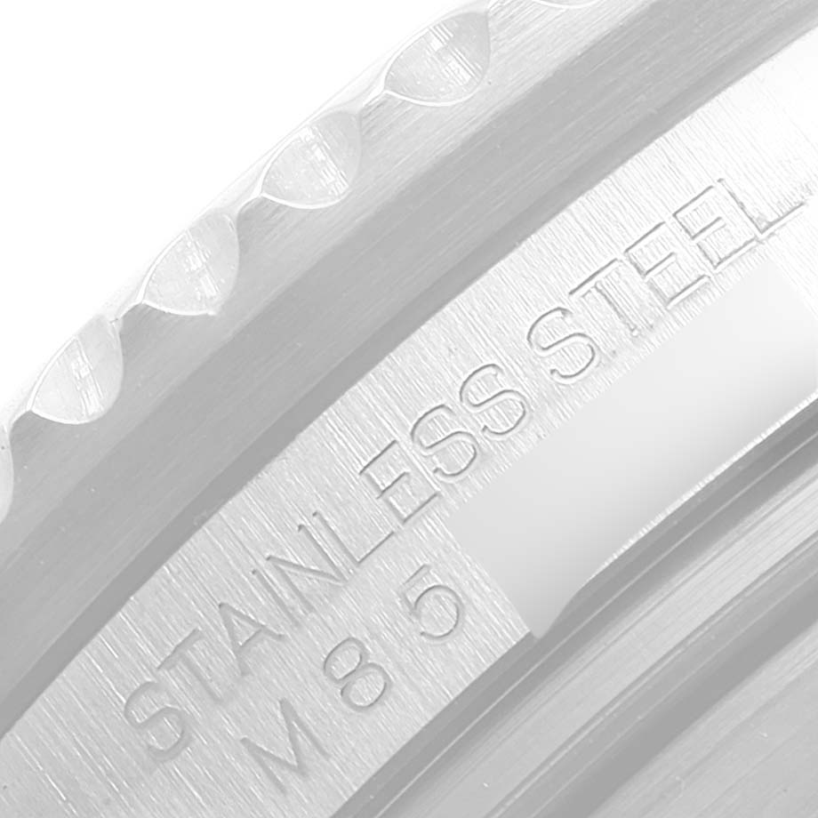 The image shows a close-up of the engraved and serrated stainless steel bezel of the Rolex Sea-Dweller 16600 Men
s Stainless Steel Black Dial 16600 Men
s Stainless Steel Black Dial watch.