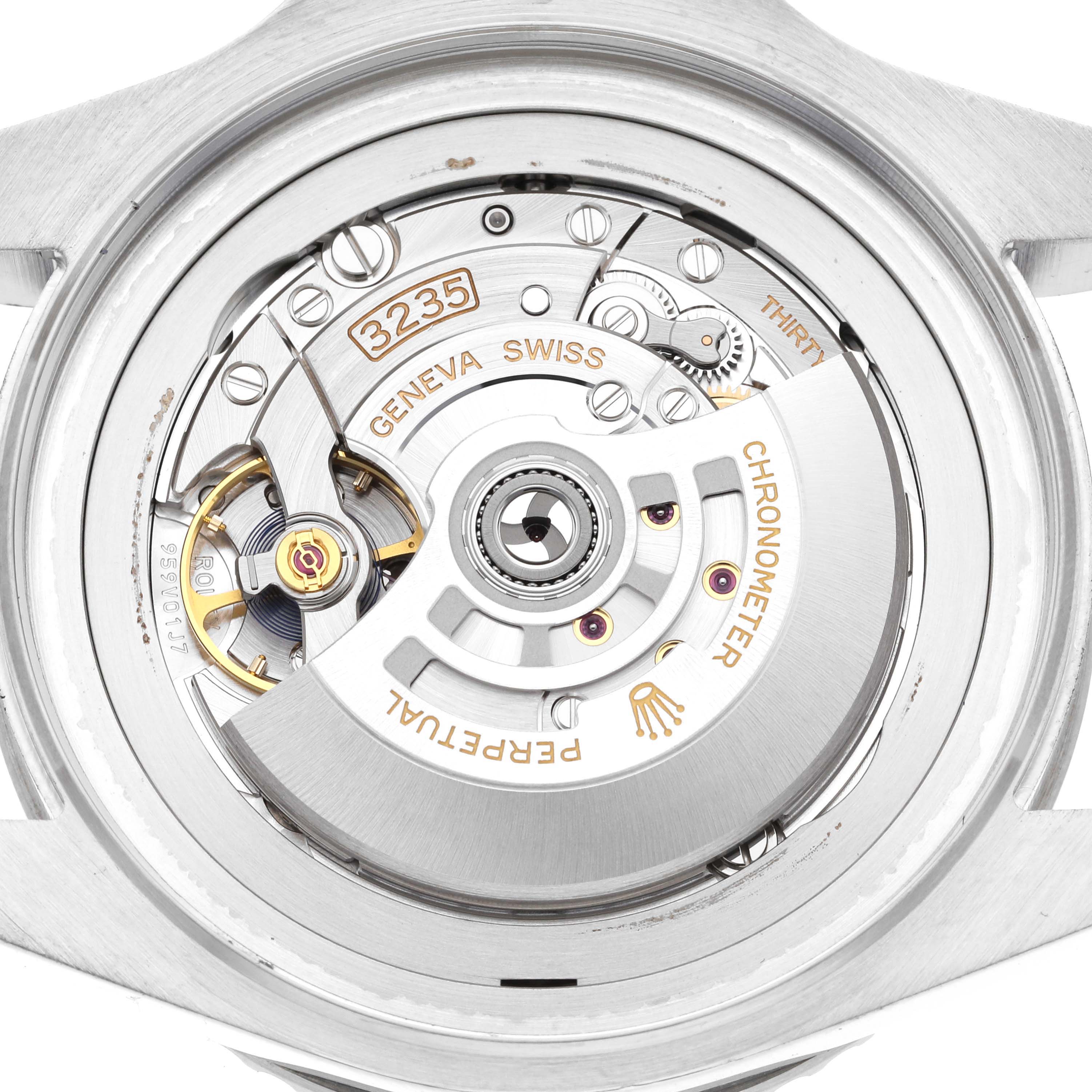 The image shows the back side of a Rolex Sea-Dweller 136660 Men
s Stainless Steel Black Dial 136660 Men
s Stainless Steel Black Dial, displaying its intricate movement mechanism labeled "3235" and "Perpetual Chronometer."