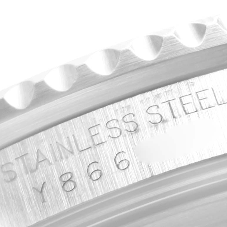 This image shows a close-up of the engraved case and bezel edge of a Rolex Submariner 16610 Men
s Stainless Steel Black Dial 16610 Men
s Stainless Steel Black Dial watch.