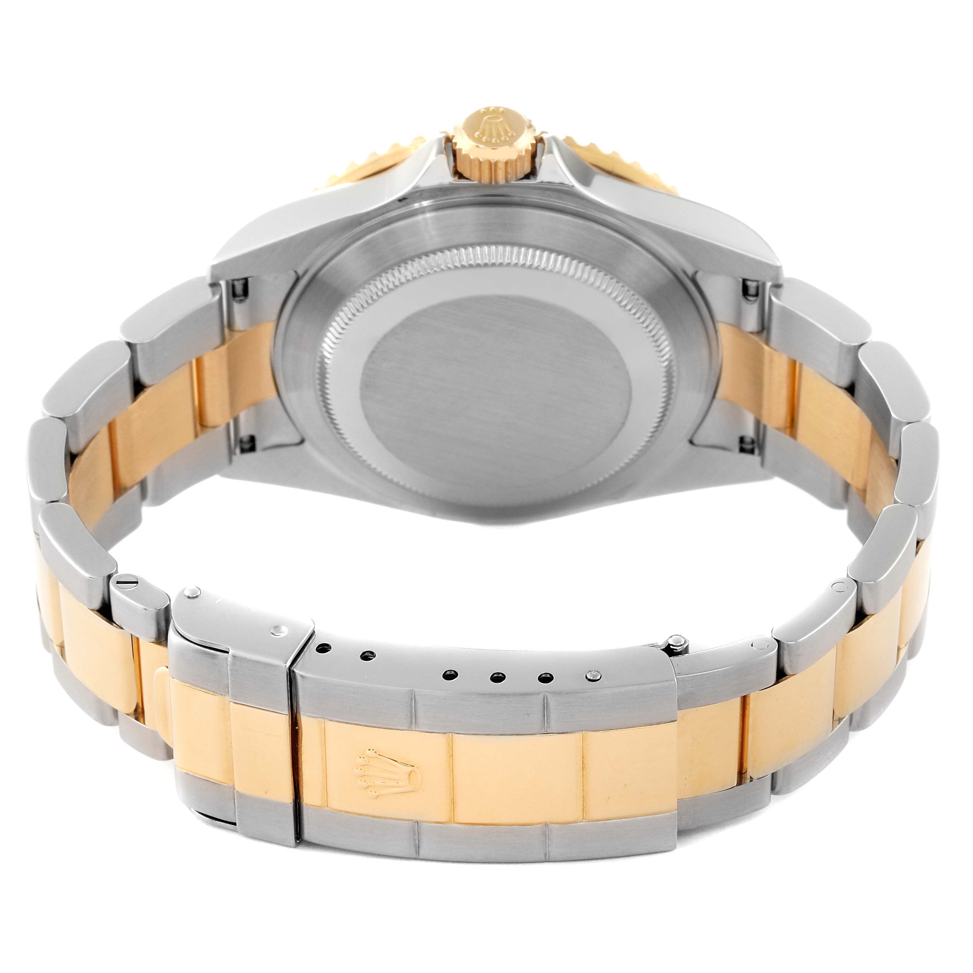 The image shows the back view of a Rolex Submariner 16613 Men's Steel and Gold (two tone) Blue Dial 16613 Men's Steel and Gold (two tone) Blue Dial watch, highlighting the clasp, bracelet, and case back.