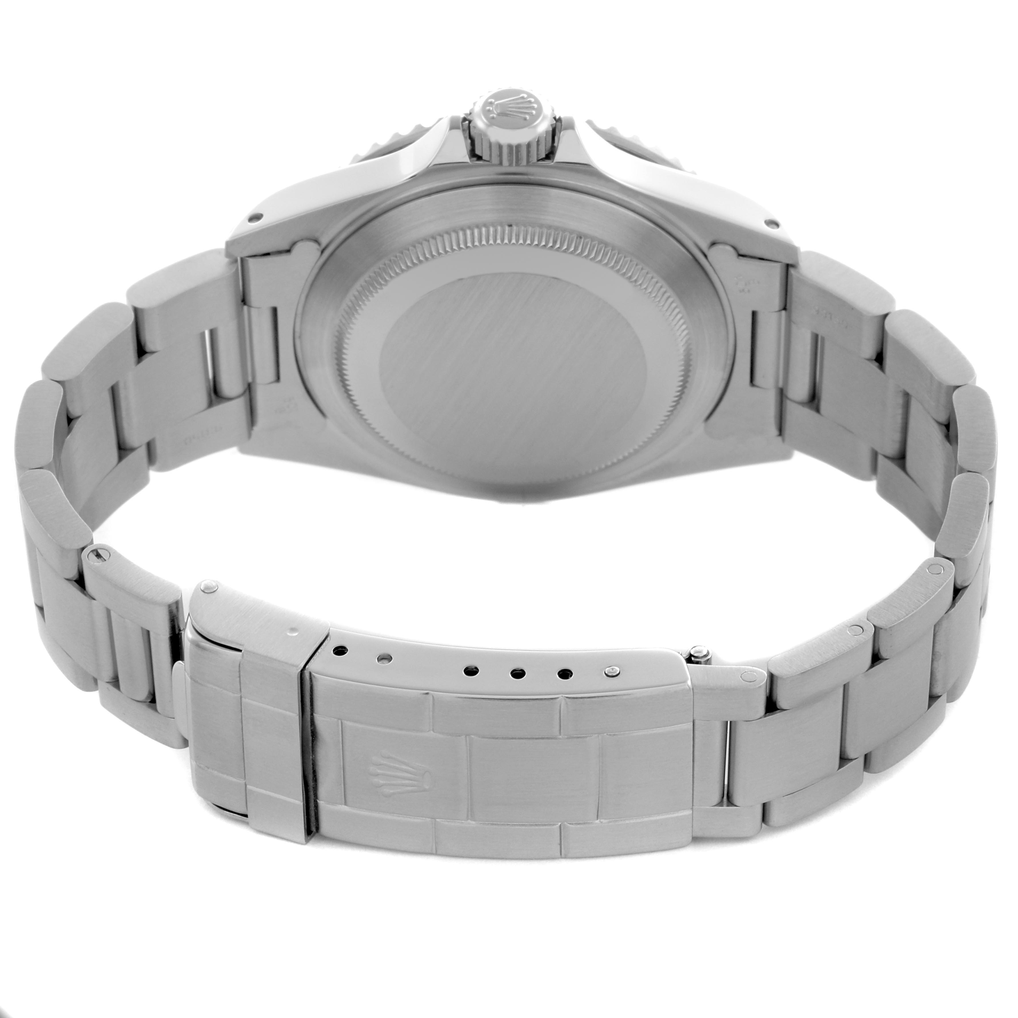 The image shows the back of a Rolex Submariner 14060 Men
s Stainless Steel Black Dial 14060 Men
s Stainless Steel Black Dial, highlighting the case back, bracelet, and clasp from a rear angle.