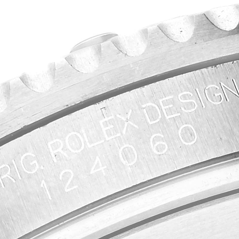 This close-up image shows the engravings on the side of the Rolex Submariner 124060 Men
s Stainless Steel Black Dial 124060 Men
s Stainless Steel Black Dial
s case, revealing the model number.