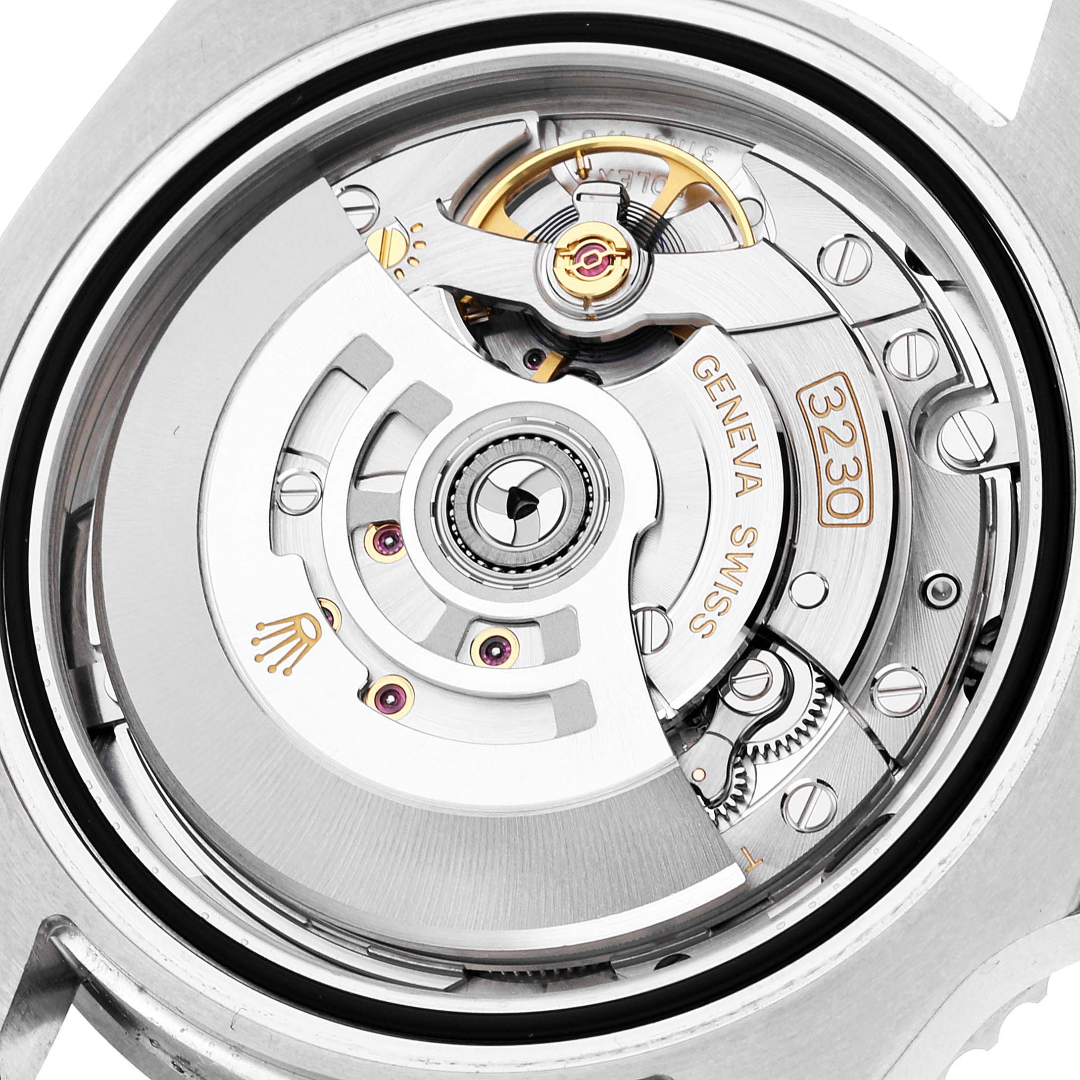 The image shows a close-up view of the inner mechanical movement of a Rolex Submariner 124060 Men
s Stainless Steel Black Dial 124060 Men
s Stainless Steel Black Dial watch.