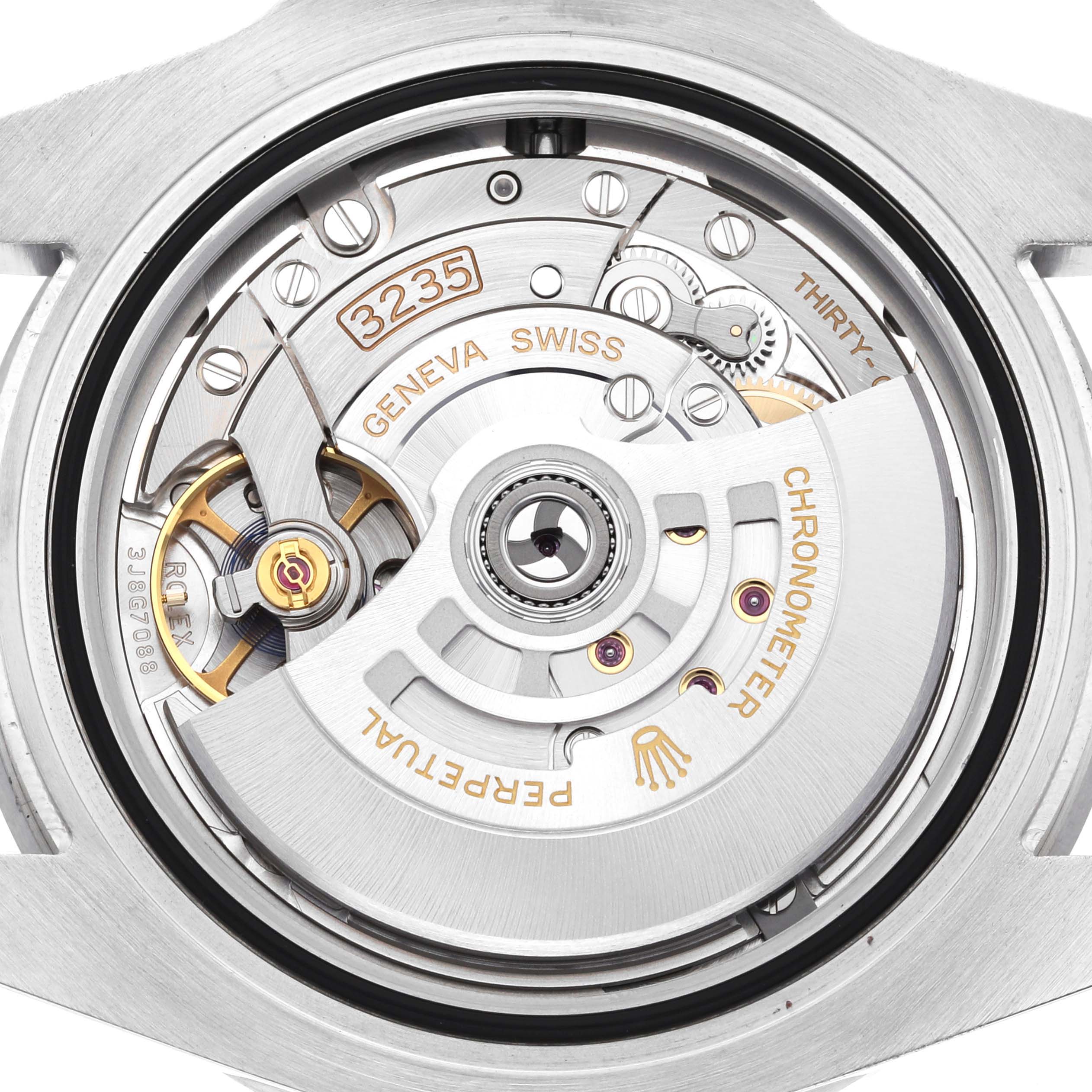 The image shows the Rolex Submariner 126610LV Men's Stainless Steel Black Dial 126610LV Men's Stainless Steel Black Dial watch movement and internal mechanism viewed from the back.