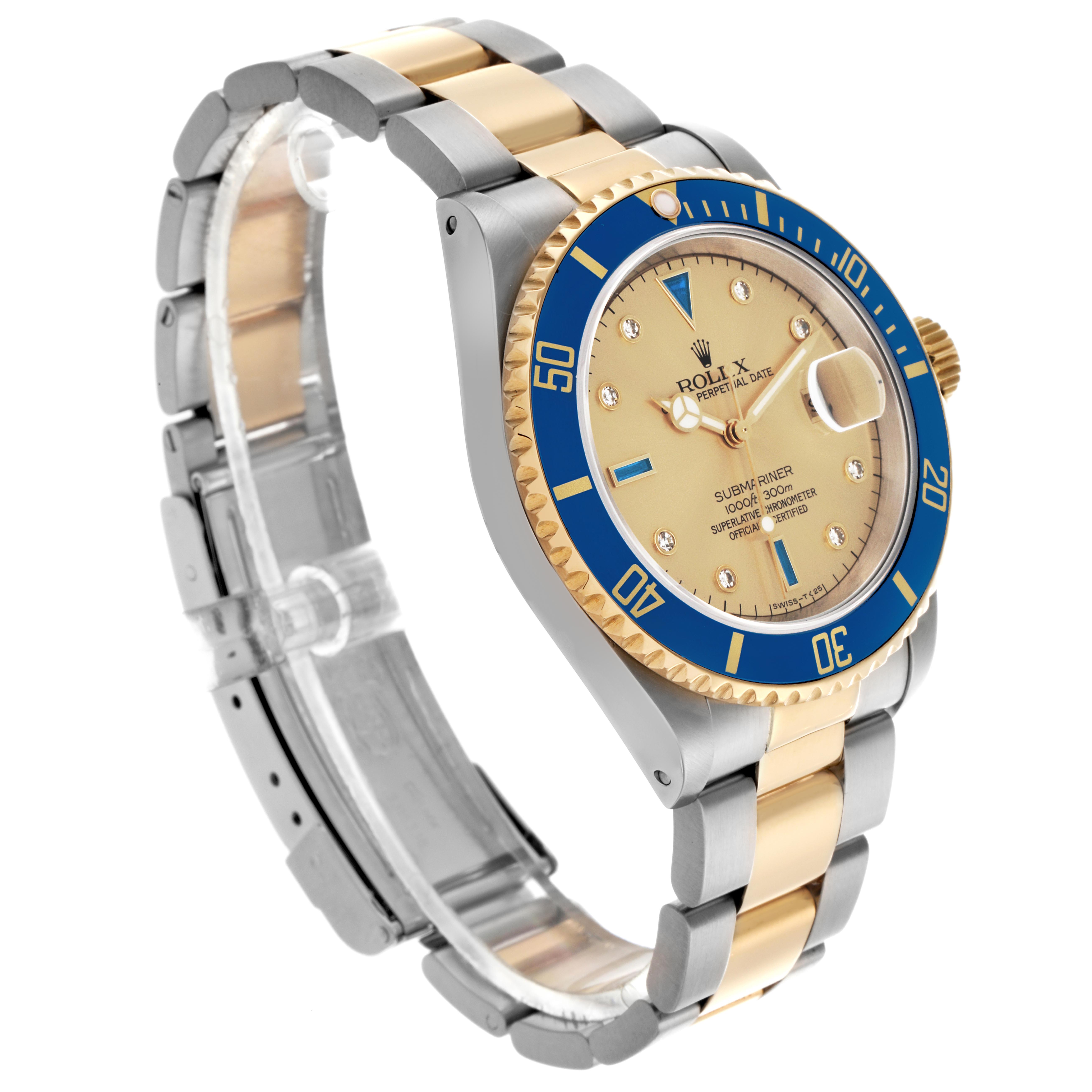 The Rolex Submariner 16613 Men
s Steel and Gold (two tone) Champagne Dial 16613 Men
s Steel and Gold (two tone) Champagne Dial is shown at a three-quarter angle, displaying the bezel, dial, and bracelet.