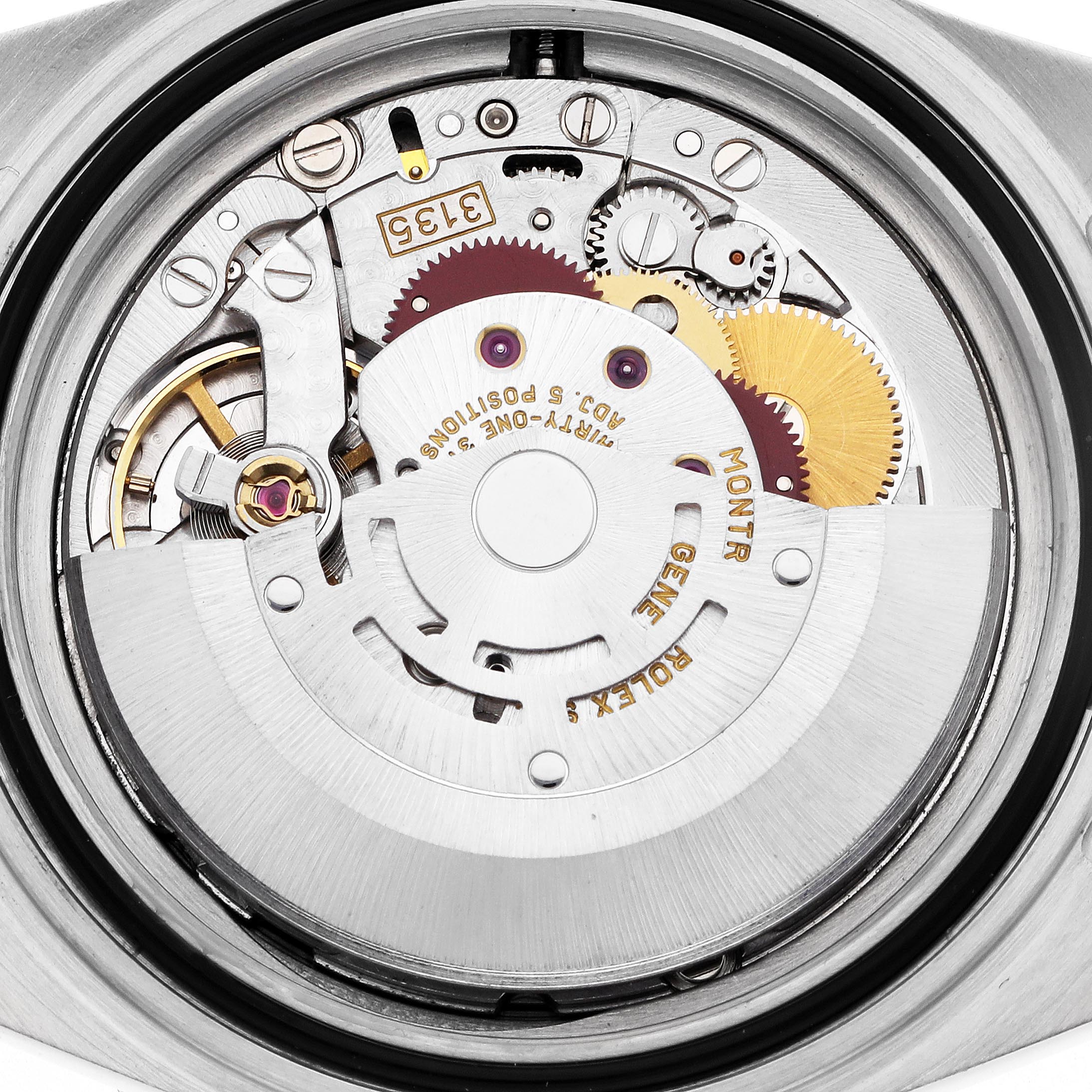 The image shows the movement of a Rolex Submariner 16613 Men
s Steel and Gold (two tone) Champagne Dial 16613 Men
s Steel and Gold (two tone) Champagne Dial, viewed from the back, highlighting its gears and components.