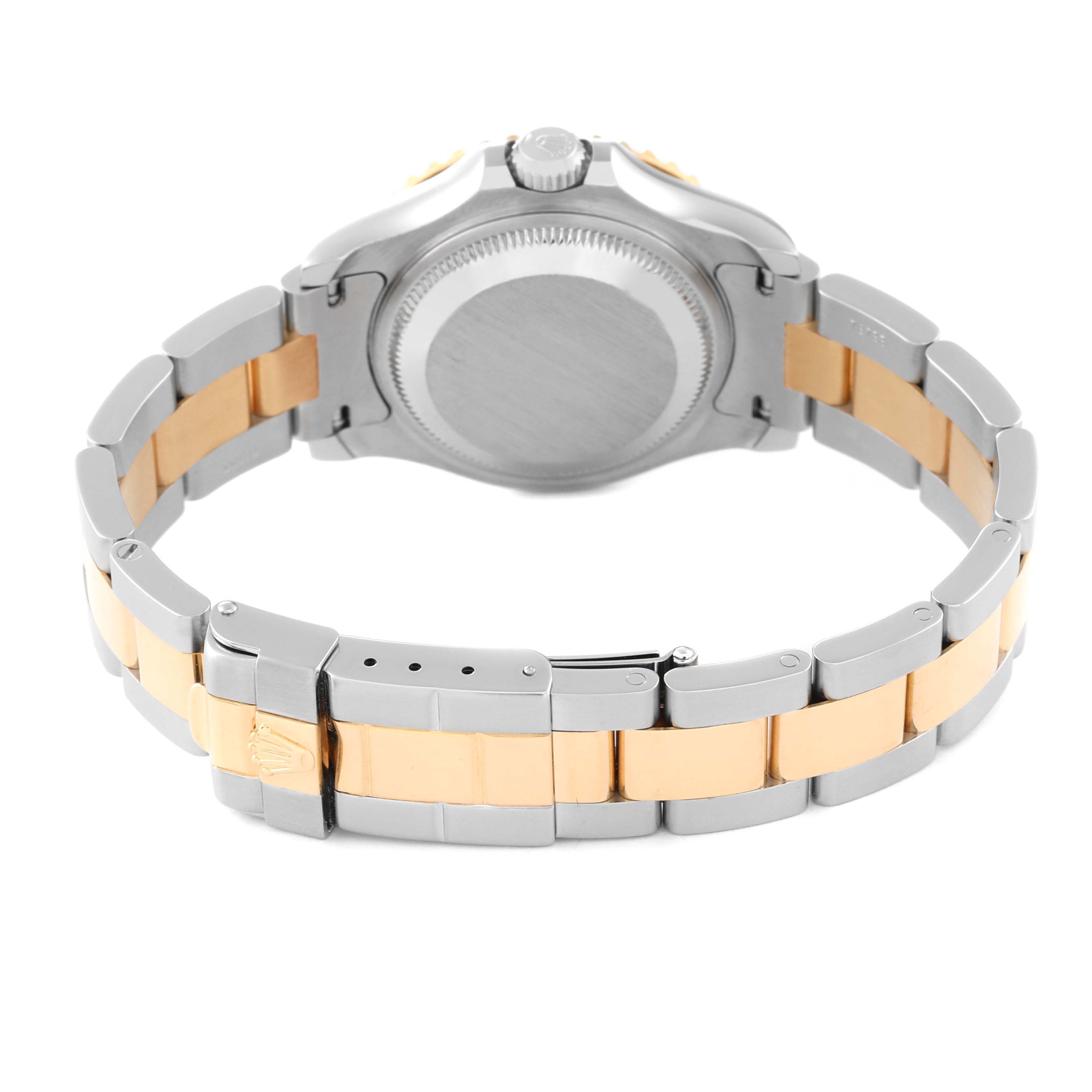 This image shows the back case and bracelet of the Rolex Yacht-Master 69623 Women's Steel and Gold (two tone) White Dial 69623 Women's Steel and Gold (two tone) White Dial, featuring a two-tone metal design.