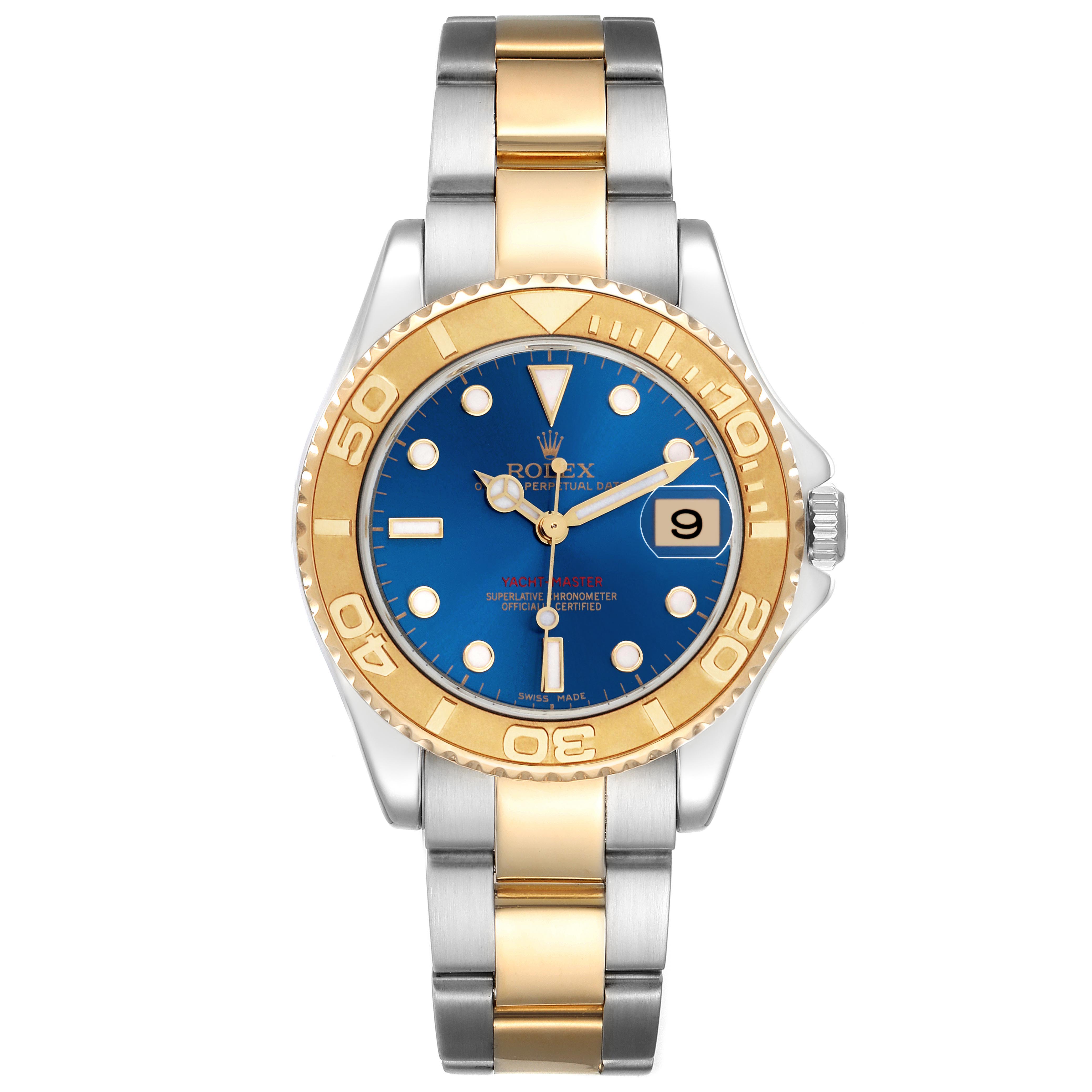 The Rolex Yacht-Master 168623 Men
s Steel and Gold (two tone) Blue Dial 168623 Men
s Steel and Gold (two tone) Blue Dial watch is shown from a front angle, highlighting the blue dial, gold bezel, and two-tone bracelet.