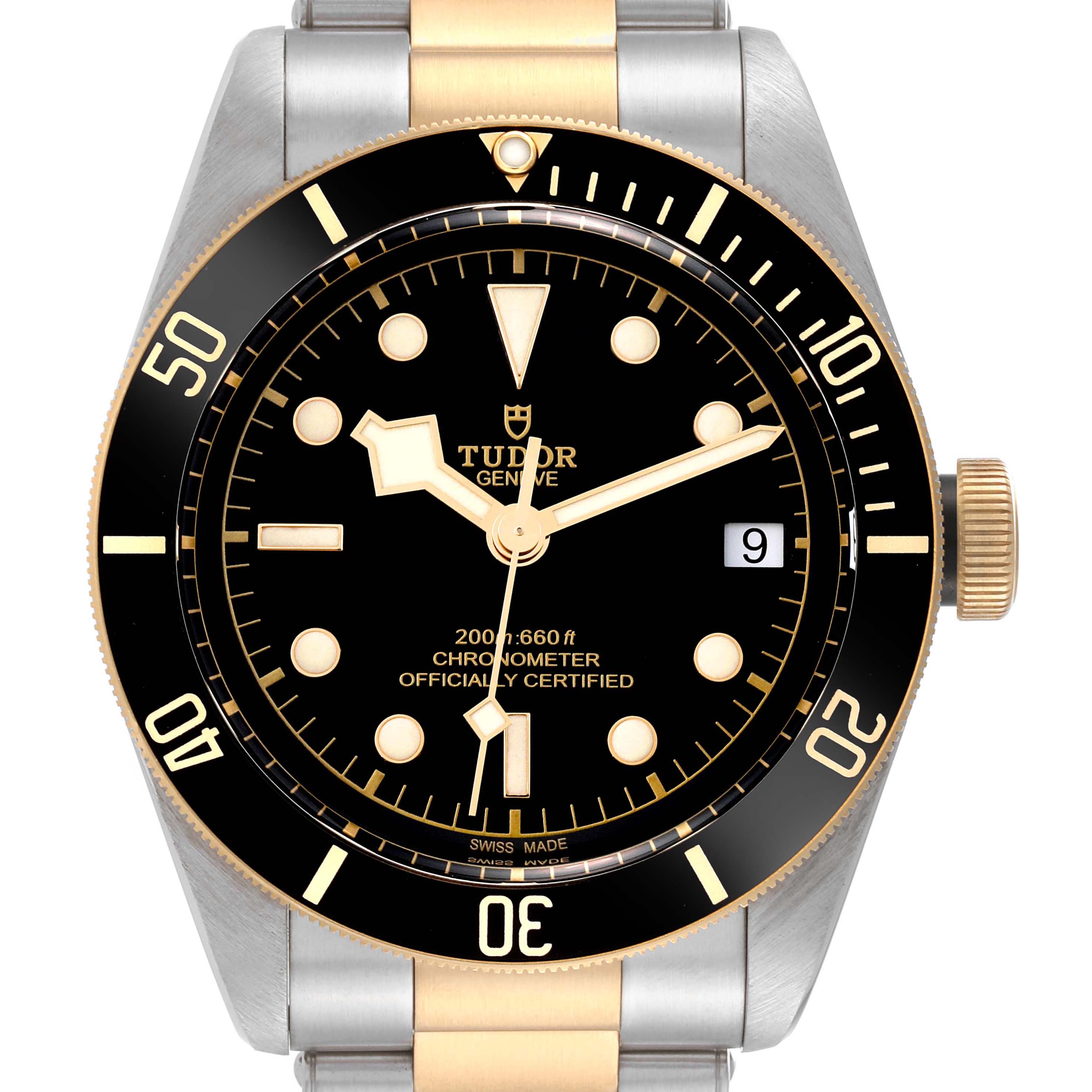 The image shows a front view of the Tudor Heritage Black Bay 79733 Men's Steel and Gold (two tone) Black Dial 79733 Men's Steel and Gold (two tone) Black Dial watch, highlighting its dial, bezel, hands, and part of the bracelet.