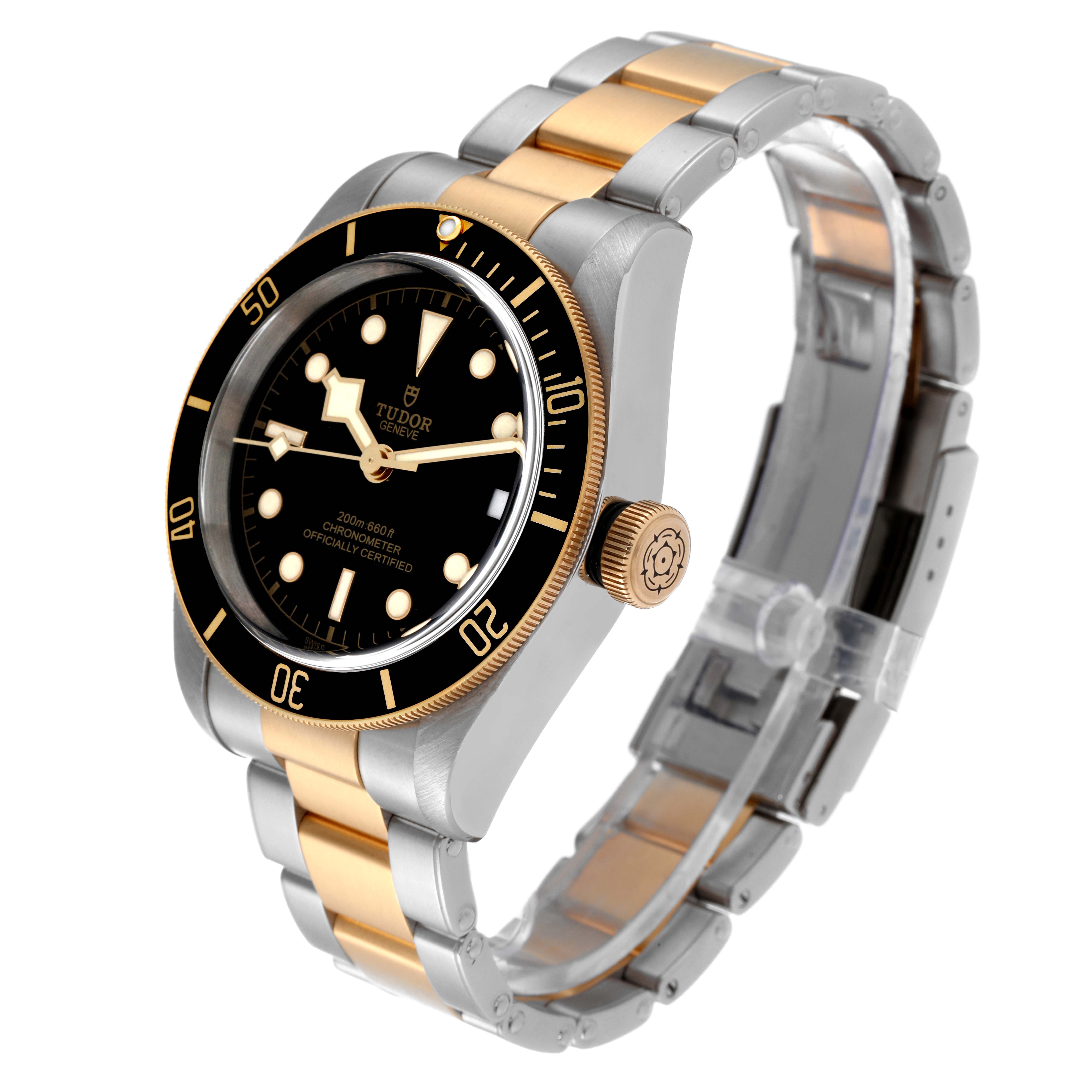 The Heritage Black Bay by Tudor is shown at a three-quarter angle, highlighting the face, bezel, crown, and bracelet.