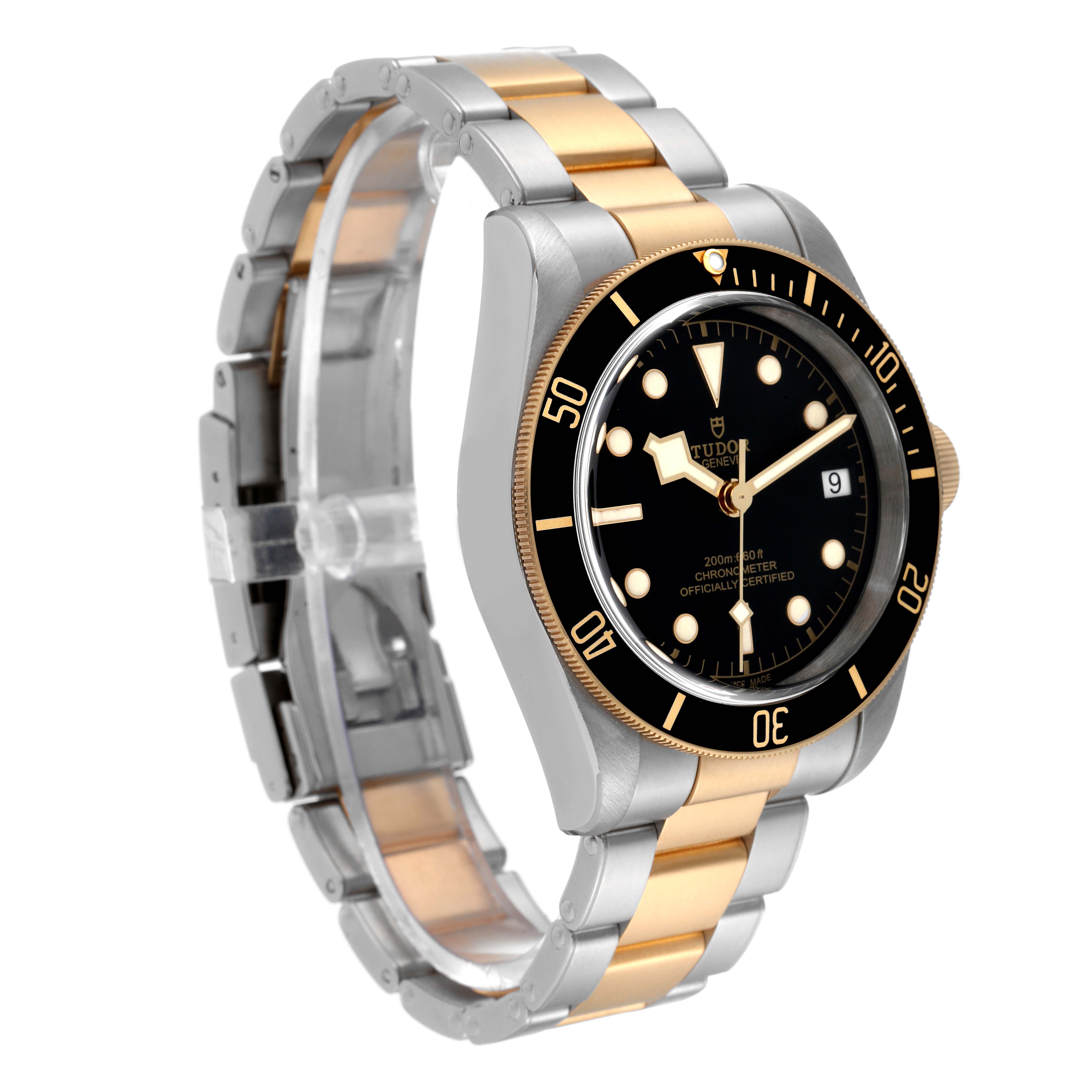 The image shows a Tudor Heritage Black Bay 79733 Men's Steel and Gold (two tone) Black Dial 79733 Men's Steel and Gold (two tone) Black Dial watch at a three-quarter angle, highlighting its case, bezel, dial, and bracelet.