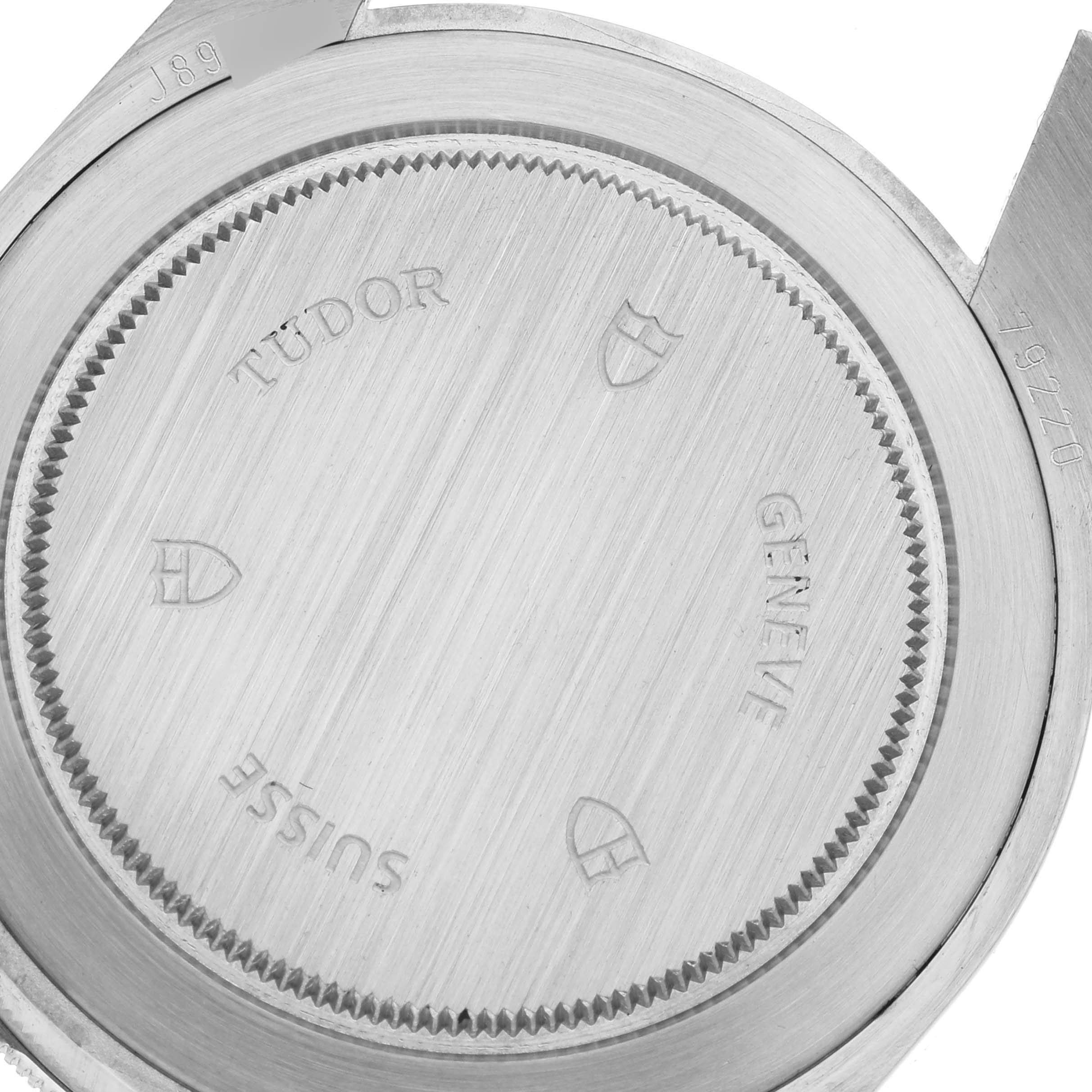 The image shows the case back of a Tudor Heritage Black Bay 79220R Men's Stainless Steel Black Dial 79220R Men's Stainless Steel Black Dial watch.