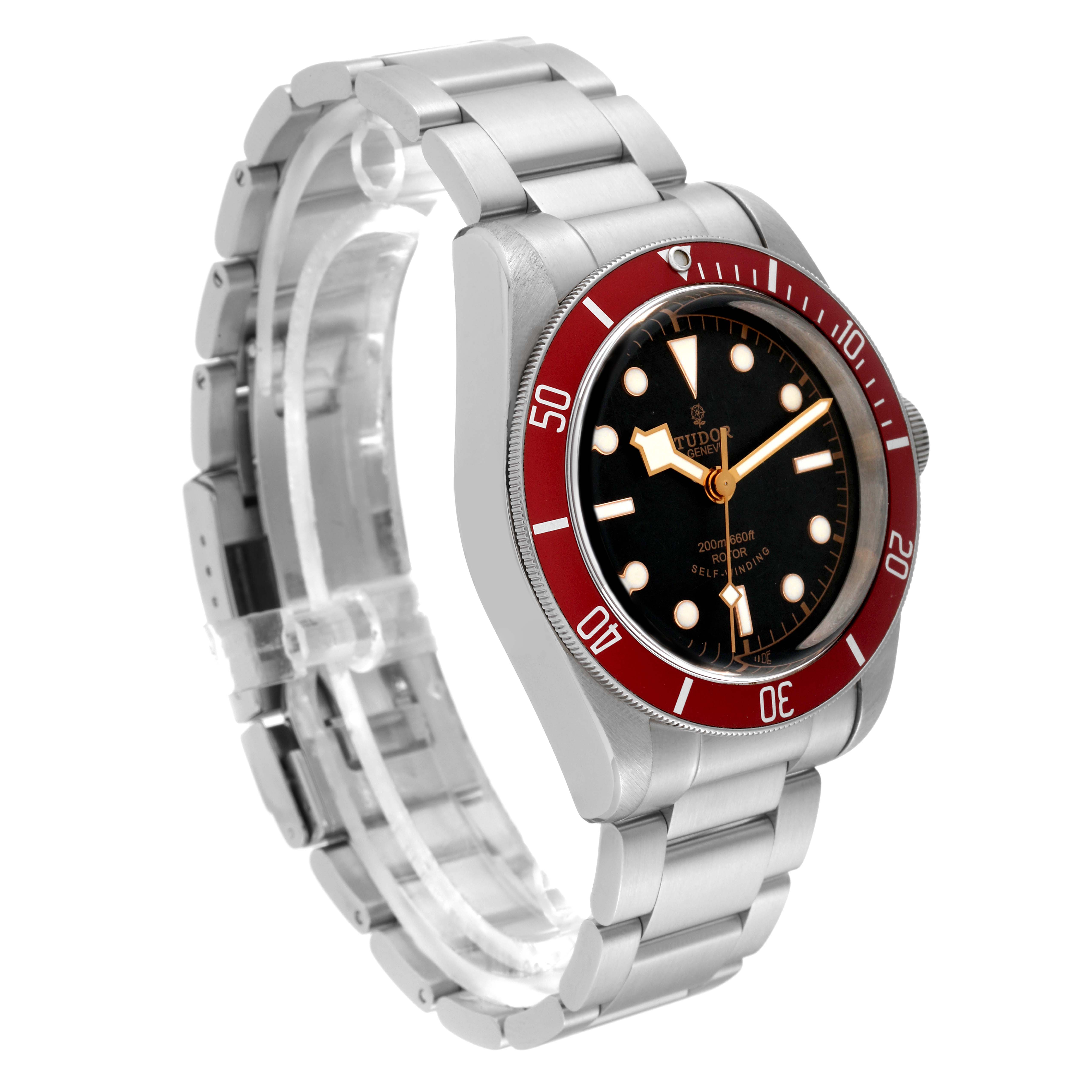 The Tudor Heritage Black Bay 79220R Men's Stainless Steel Black Dial 79220R Men's Stainless Steel Black Dial watch is shown at an angle displaying its face, bezel, case, and part of the metal bracelet.