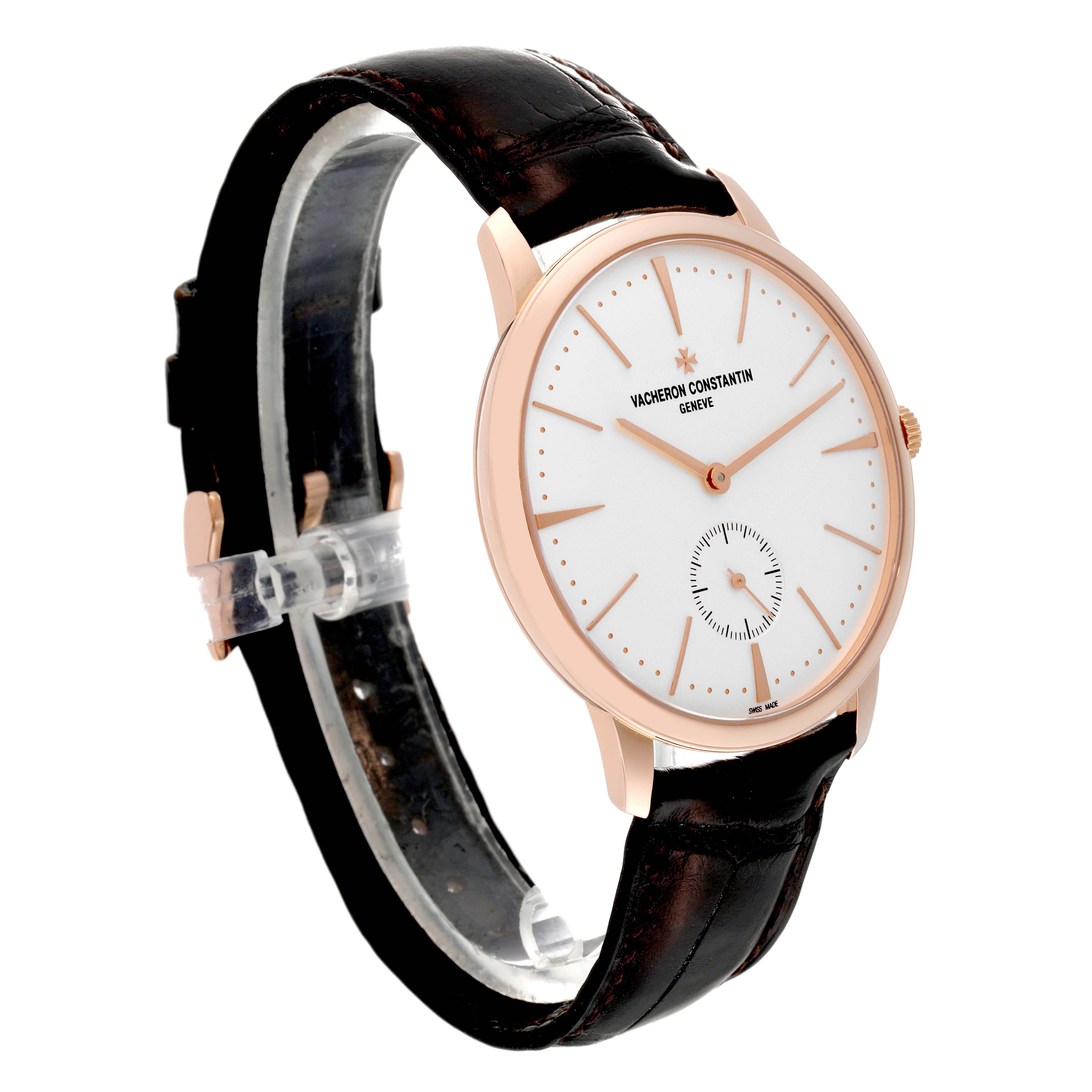 The Vacheron Constantin Patrimony 1110U/000R Men's Rose Gold Silver Dial 1110U/000R Men's Rose Gold Silver Dial watch is shown at a three-quarter angle, displaying its face, crown, and leather strap.