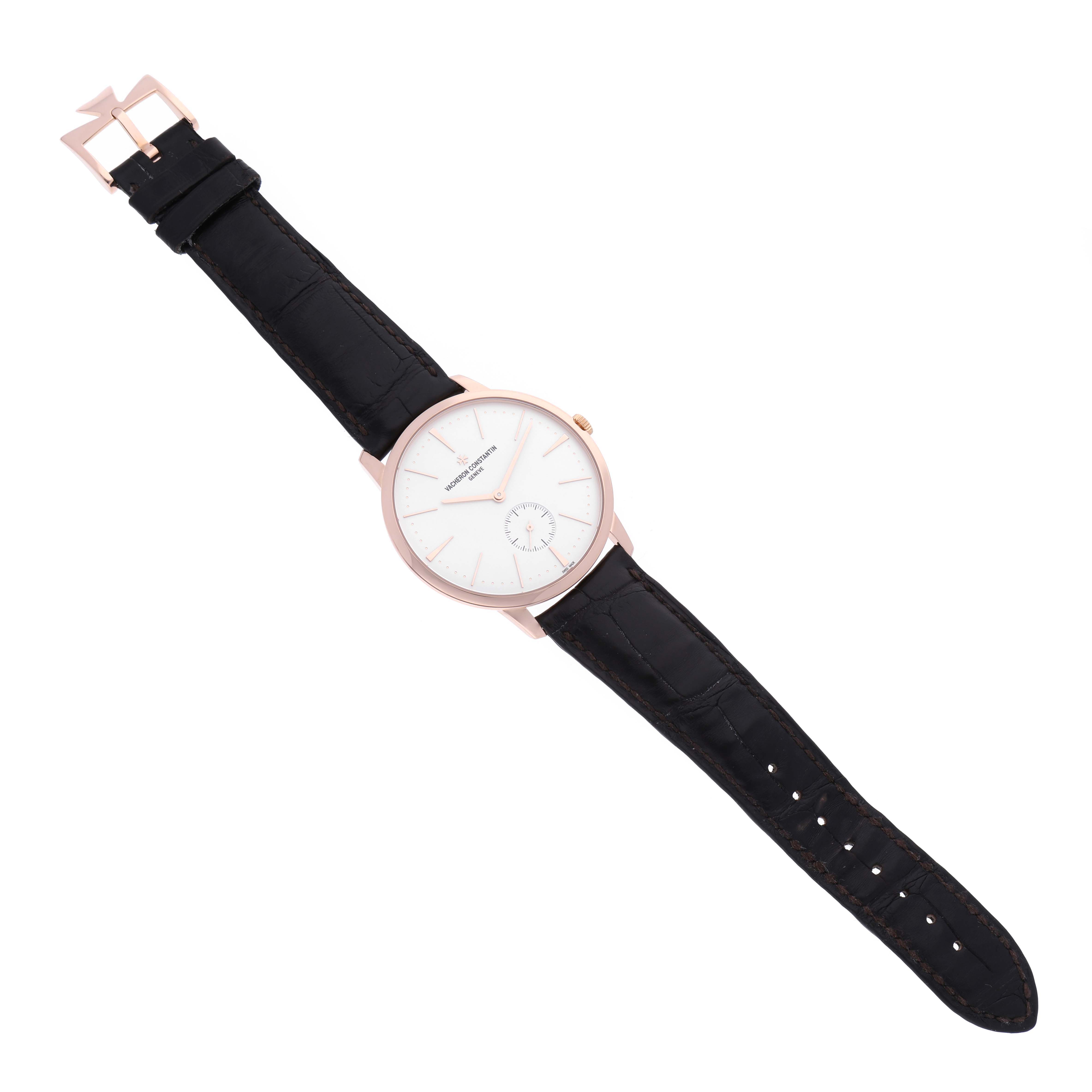 The image shows a Vacheron Constantin Patrimony 1110U/000R Men's Rose Gold Silver Dial 1110U/000R Men's Rose Gold Silver Dial watch viewed from a top-down angle, displaying the face, strap, and buckle.