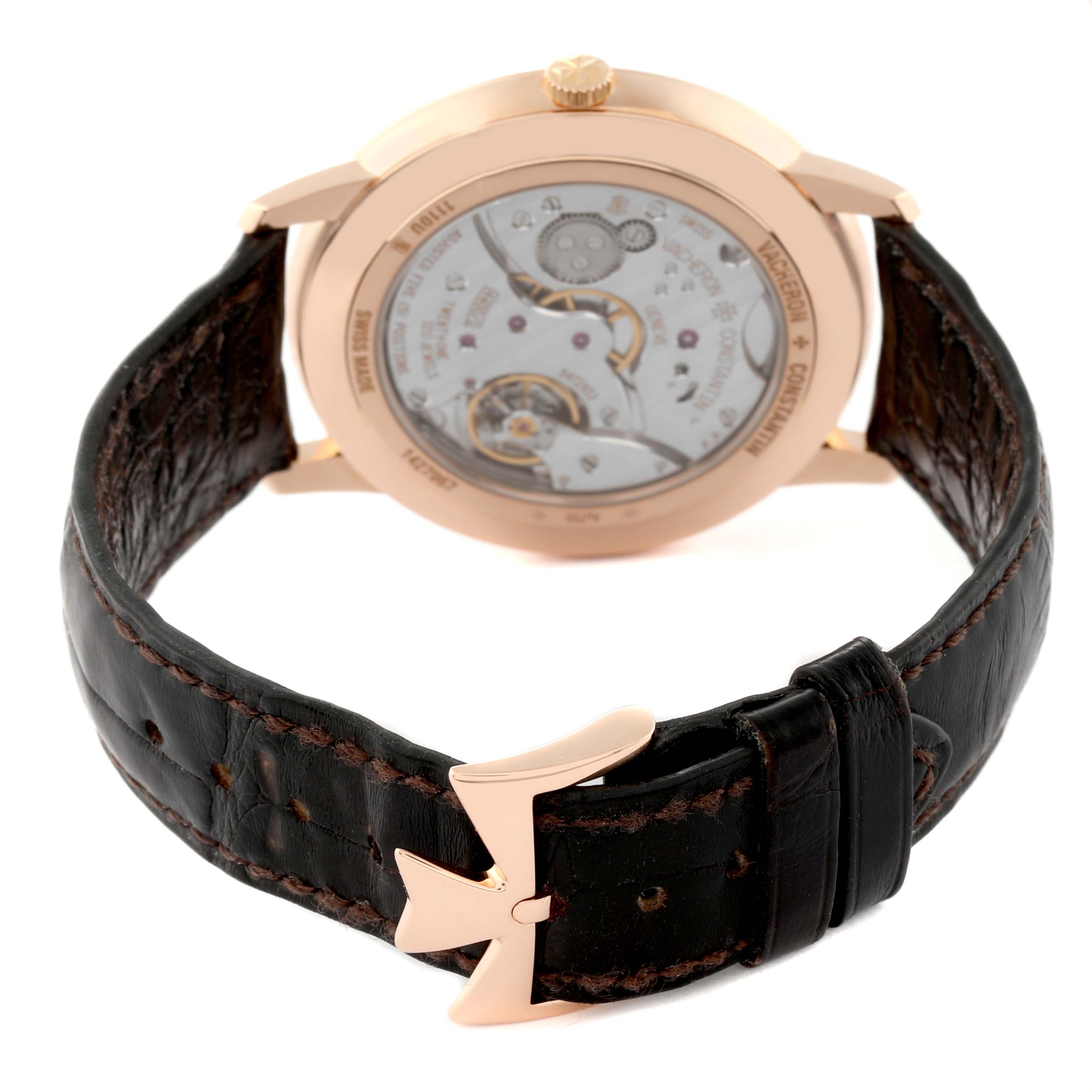This image shows the back view of a Vacheron Constantin Patrimony 1110U/000R Men's Rose Gold Silver Dial 1110U/000R Men's Rose Gold Silver Dial watch, highlighting its movement and leather strap with a distinctive buckle.