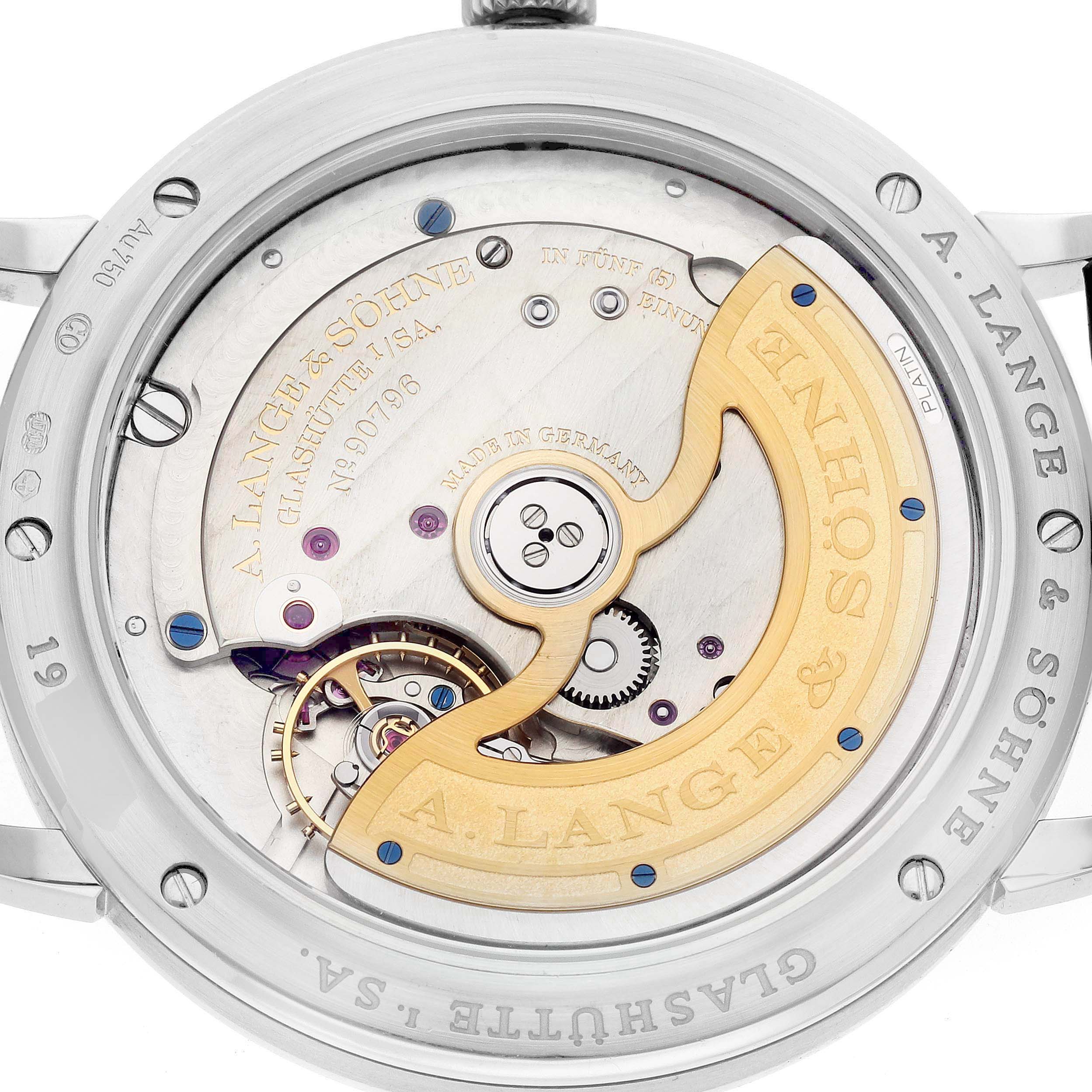 The image shows a back view of the A. Lange & Sohne Saxonia 380.026 Men's White Gold Silver Dial, highlighting its intricate mechanical movement.