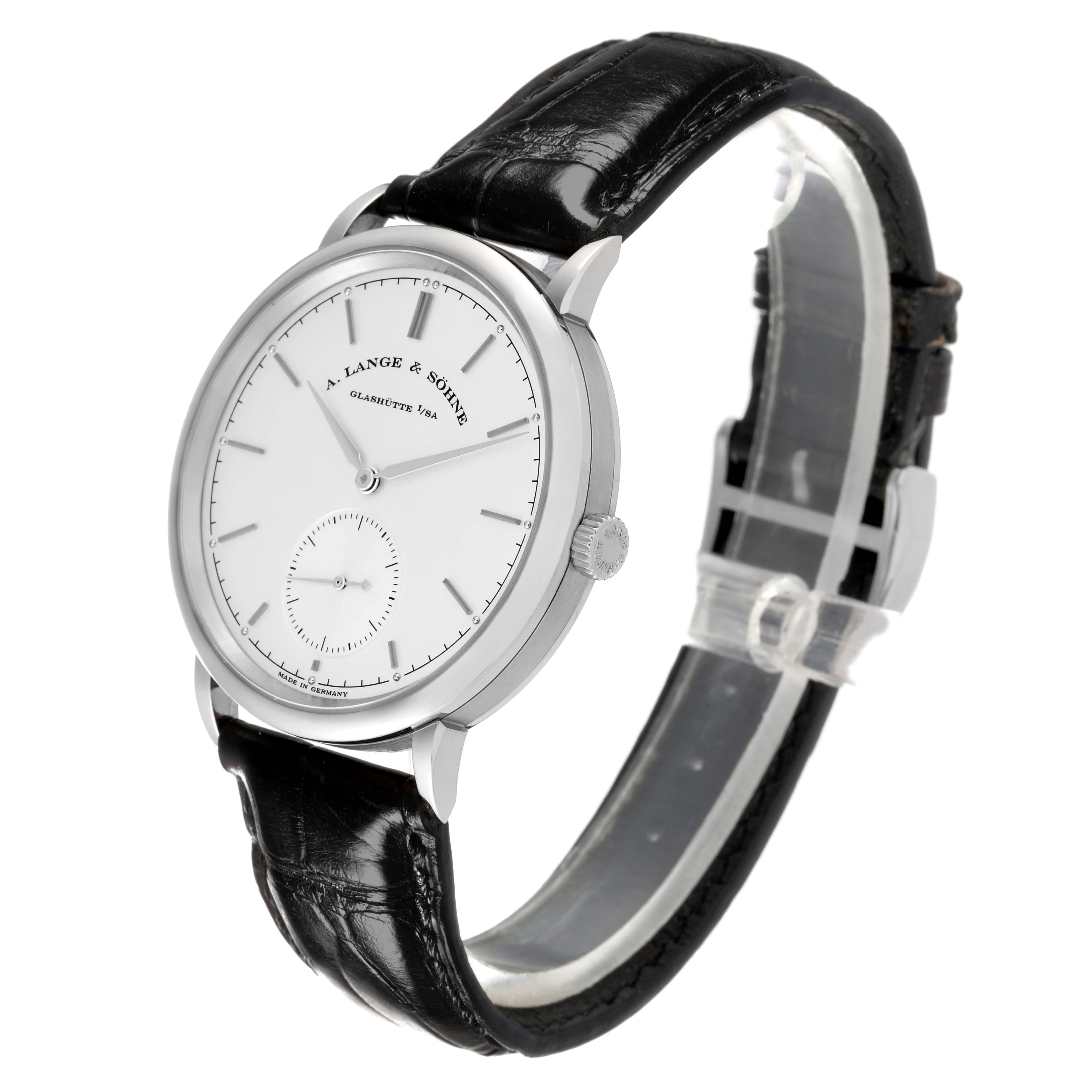 The image shows a side angle of a Saxonia model by A. Lange & Söhne, highlighting the face, bezel, crown, and black leather strap.