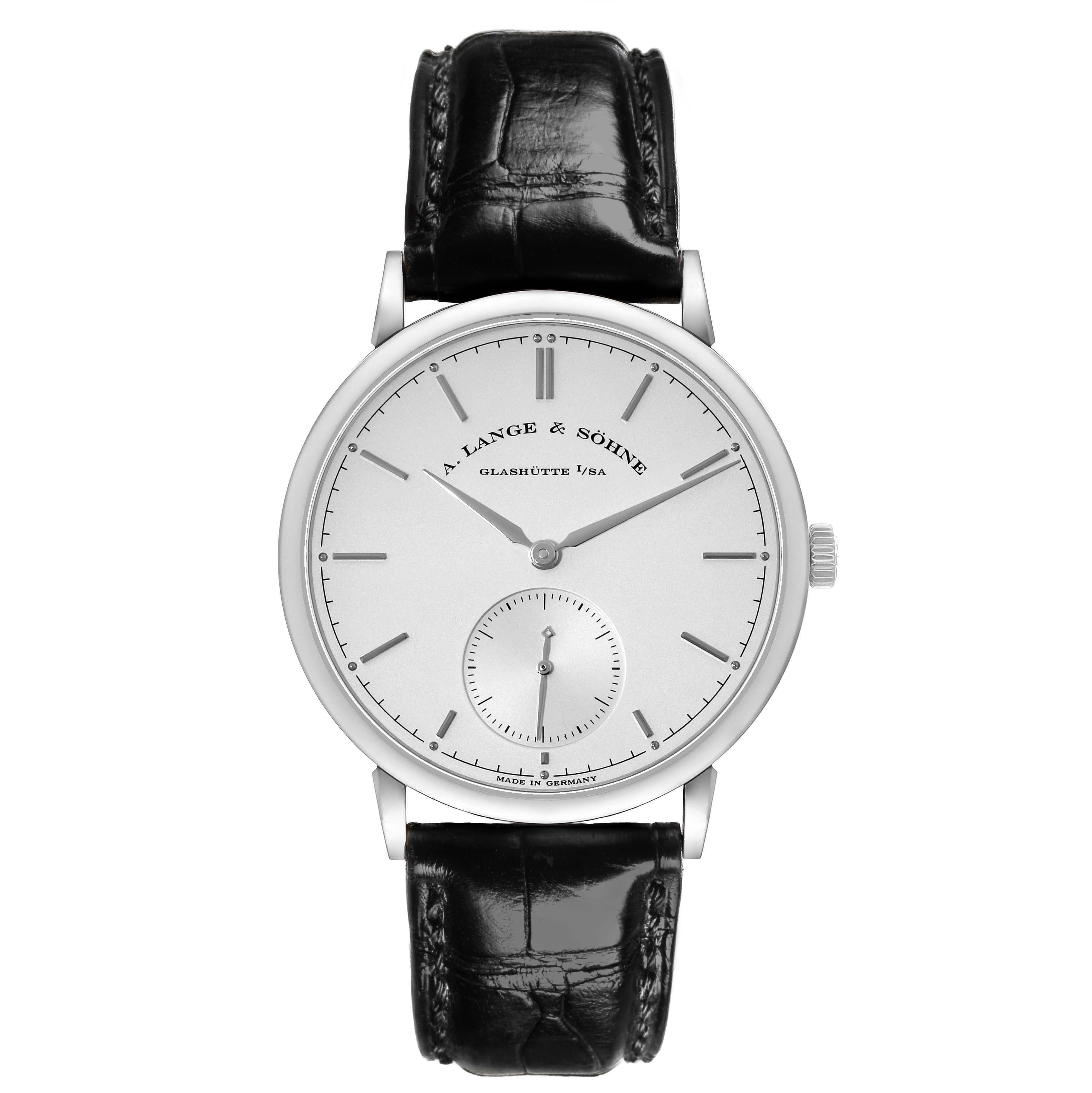 The A. Lange & Sohne Saxonia 380.026 Men's White Gold Silver Dial watch is shown from a front angle, displaying its dial, hands, and leather strap.