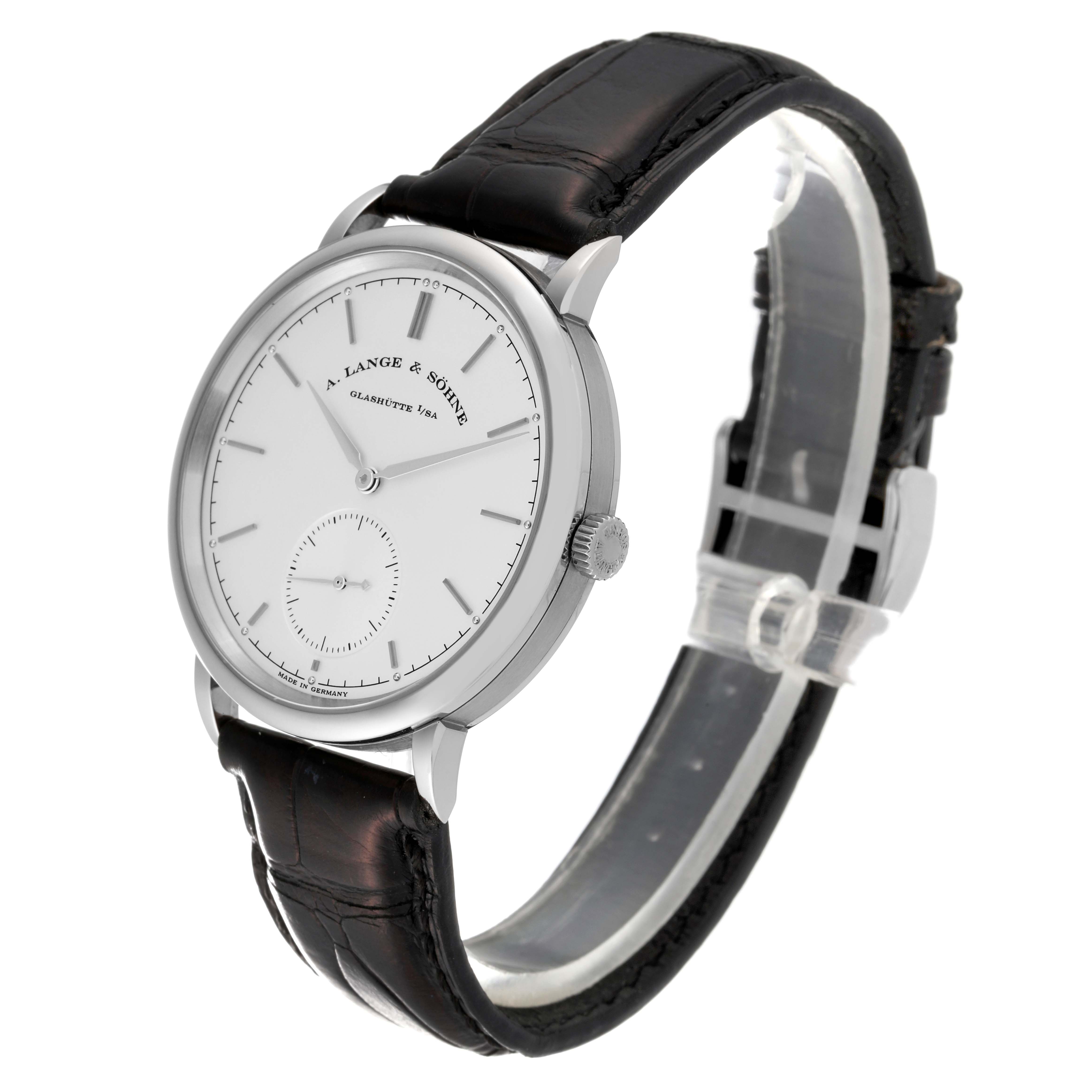 This image shows a side angle view of the A. Lange 
Sohne Saxonia 380.026 Men
s White Gold Silver Dial watch, displaying the face, crown, and leather strap.