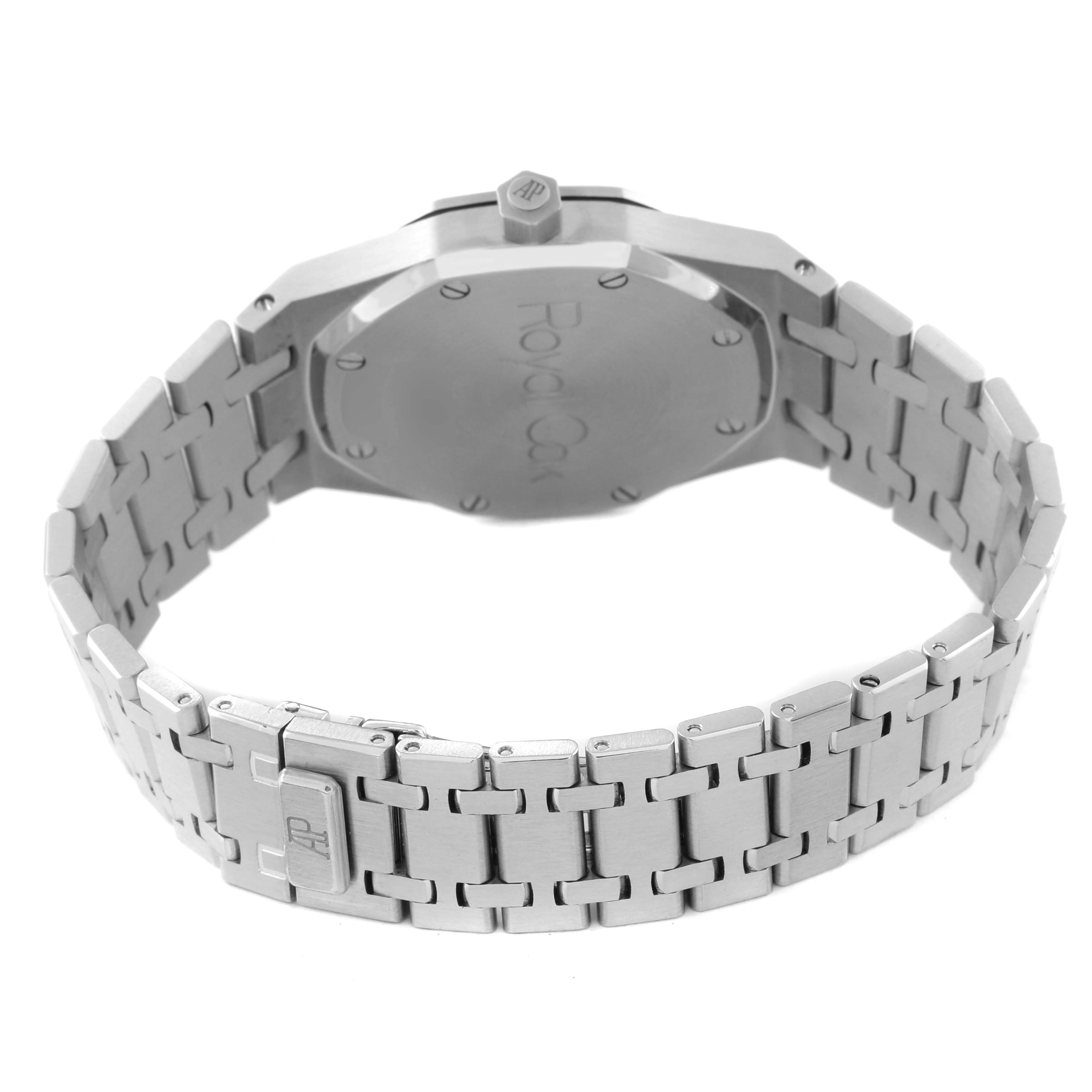 This image shows the back and bracelet of an Audemars Piguet Royal Oak 14790ST.OO.0789ST.09 Men's Stainless Steel Black Dial 14790ST.OO.0789ST.09 Men's Stainless Steel Black Dial watch, featuring its distinct hexagonal case and metal links.