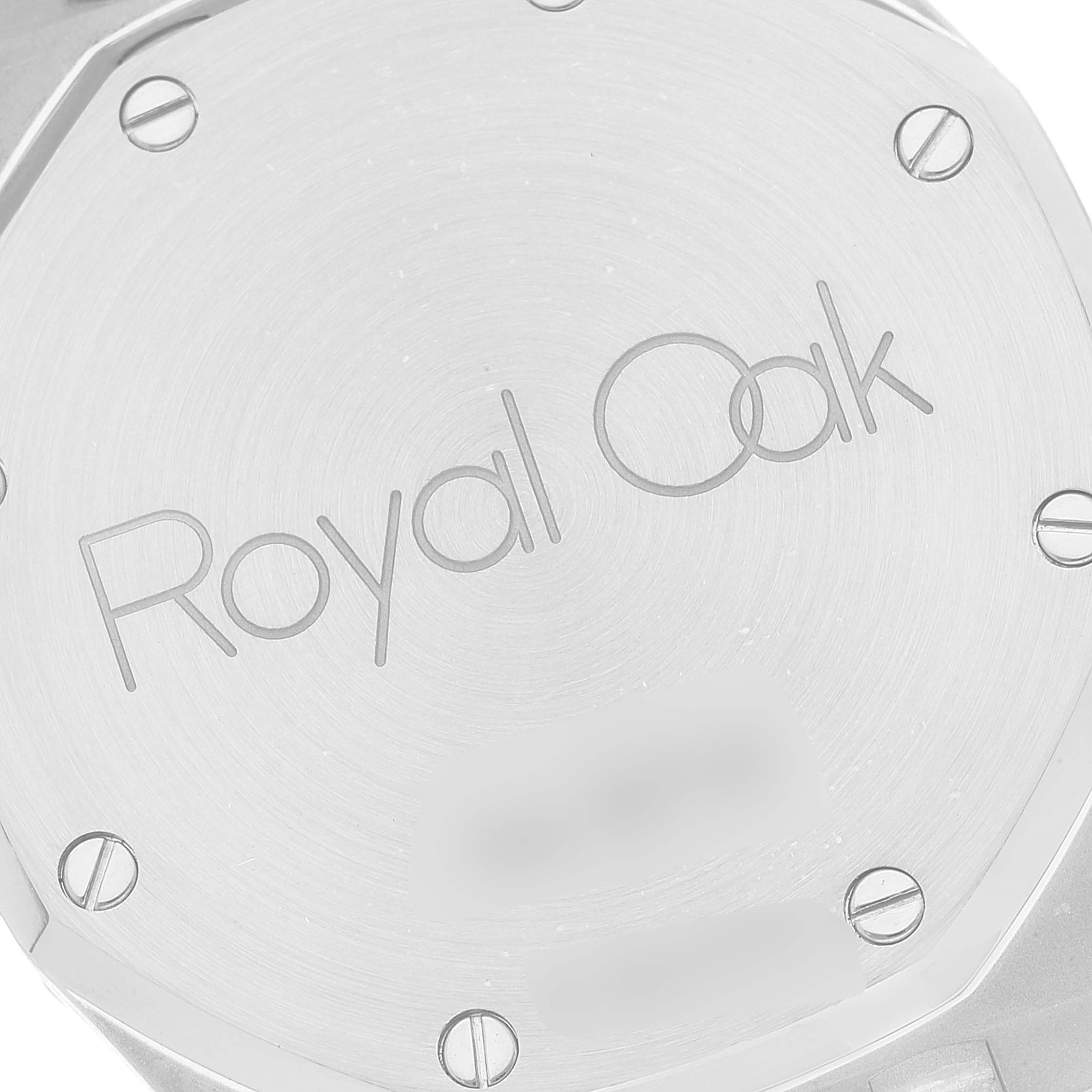 This image shows the engraved case back of a Royal Oak watch by Audemars Piguet, viewed from a back angle.