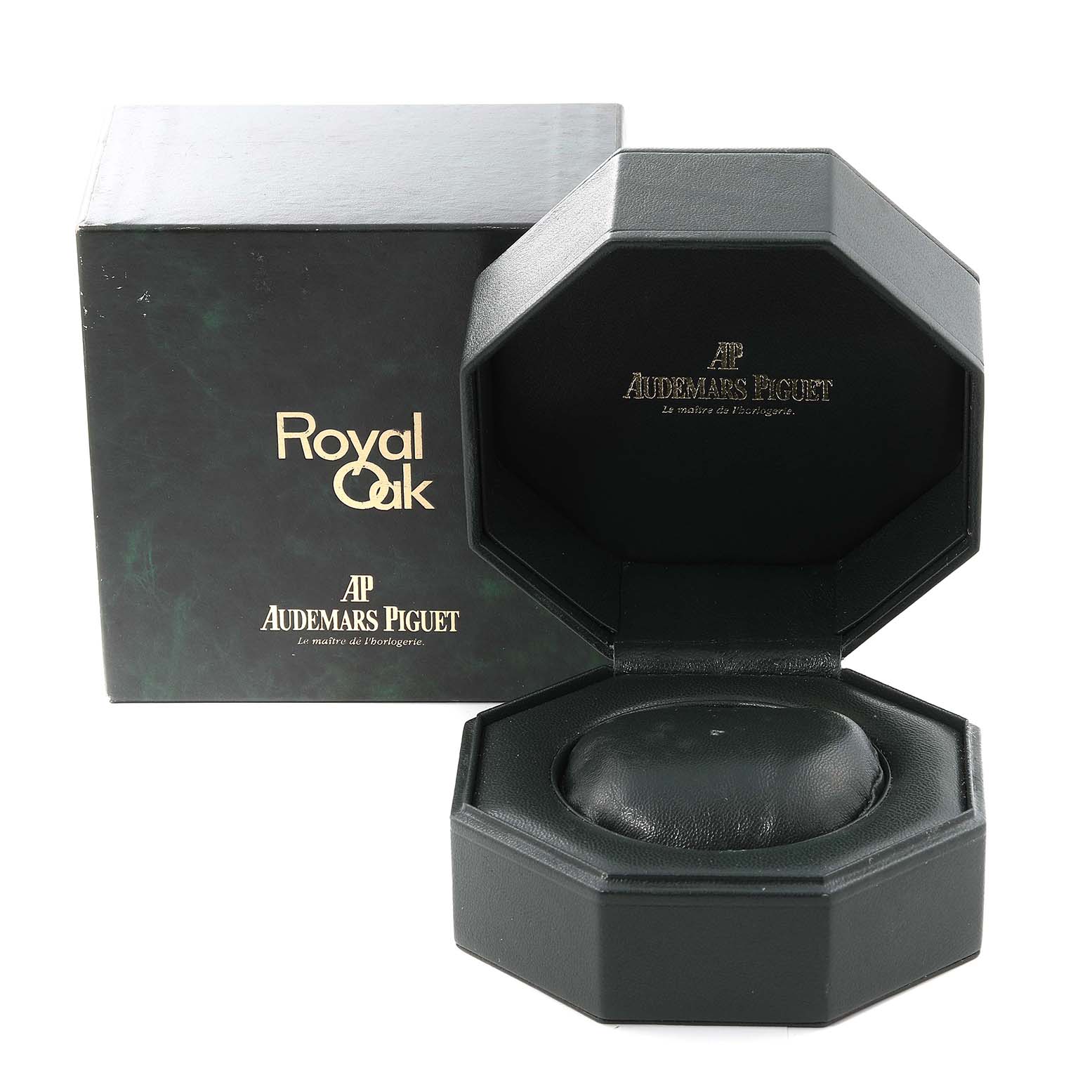 The image shows an empty Royal Oak by Audemars Piguet watch box with its lid open.
