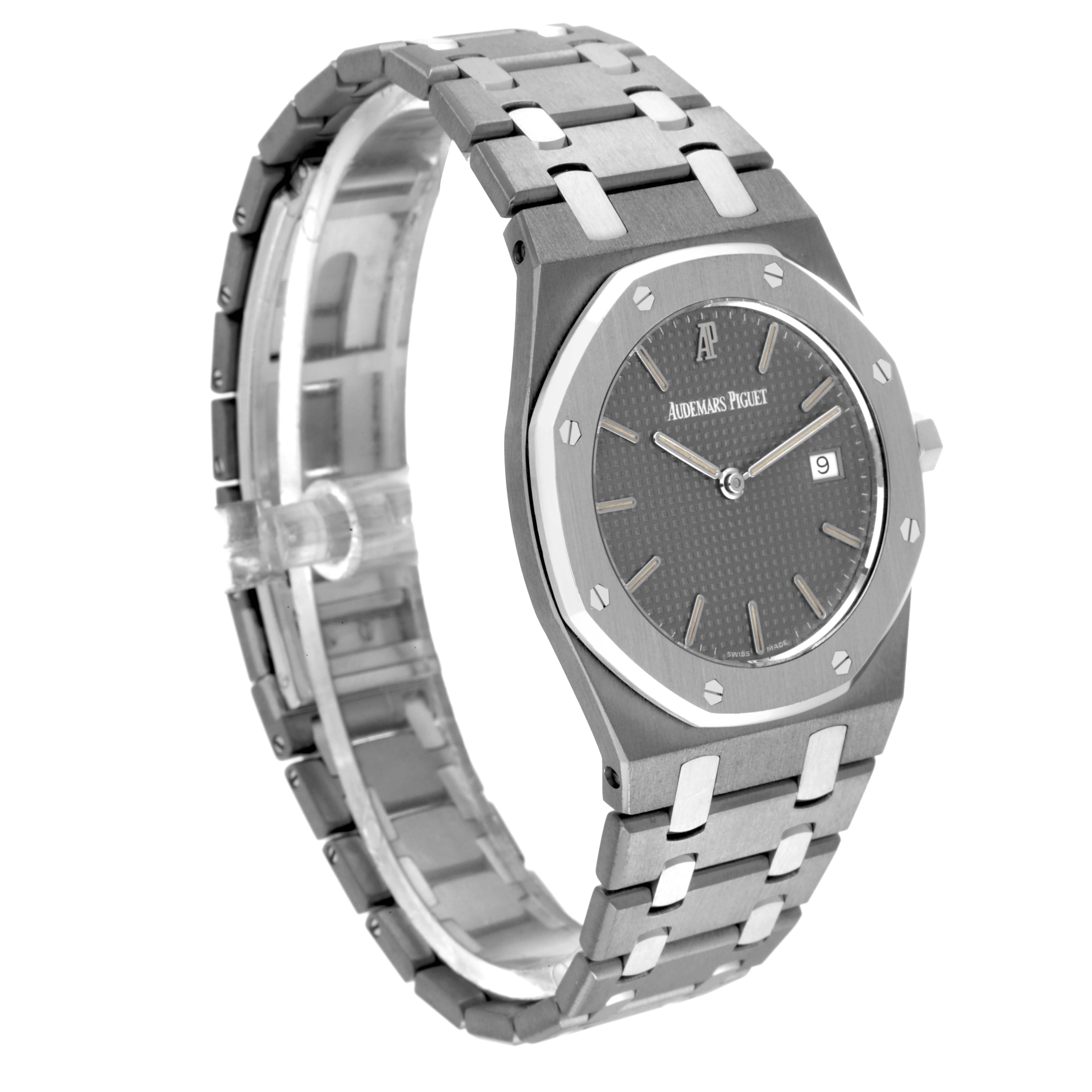 The image shows a side-angle view of the Audemars Piguet Royal Oak 56175TT Men's Stainless Steel Grey Dial 56175TT Men's Stainless Steel Grey Dial watch, highlighting its bracelet, case, and dial.