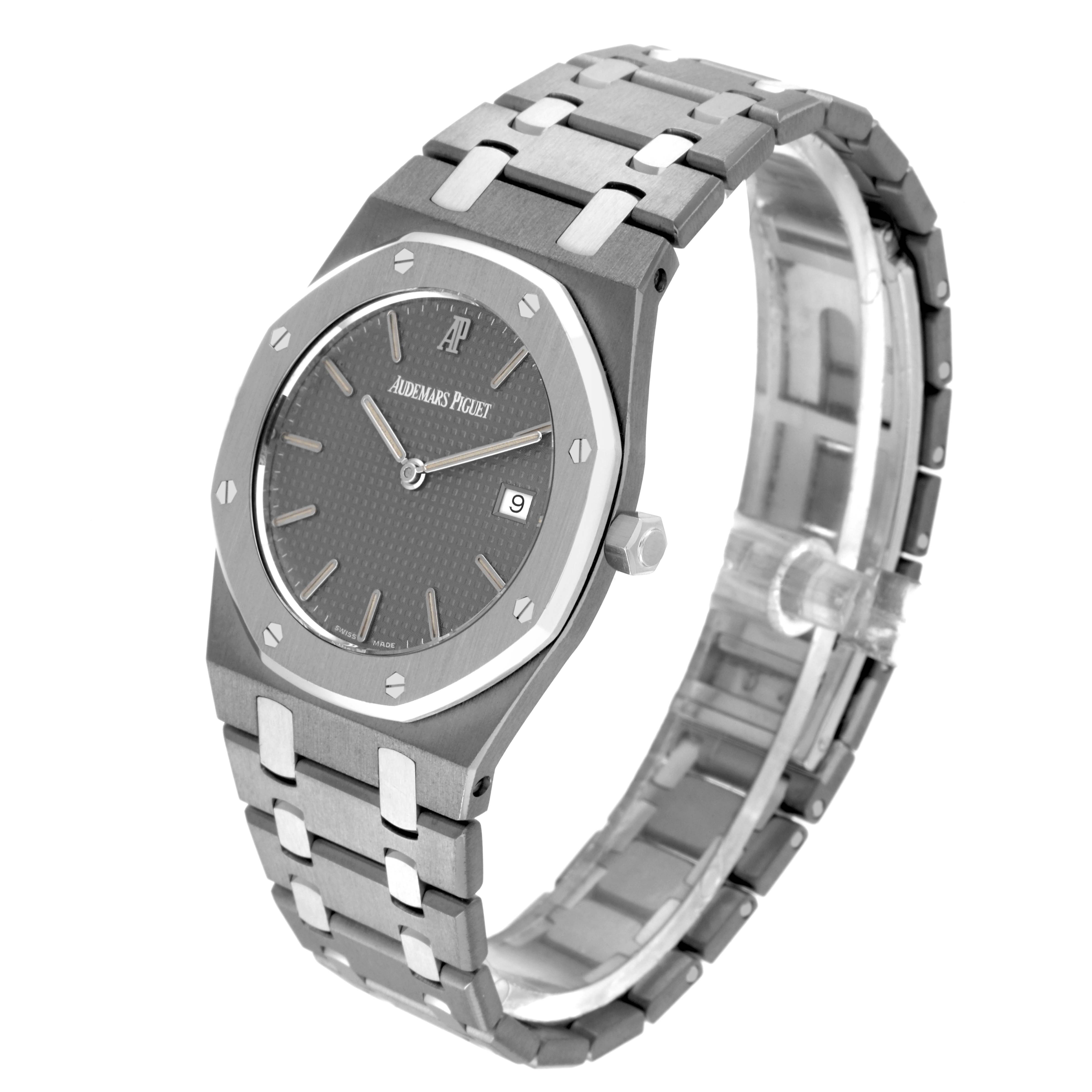 The image shows the Audemars Piguet Royal Oak 56175TT Men's Stainless Steel Grey Dial 56175TT Men's Stainless Steel Grey Dial model, highlighting the face, bracelet, bezel, and crown from an angled perspective.