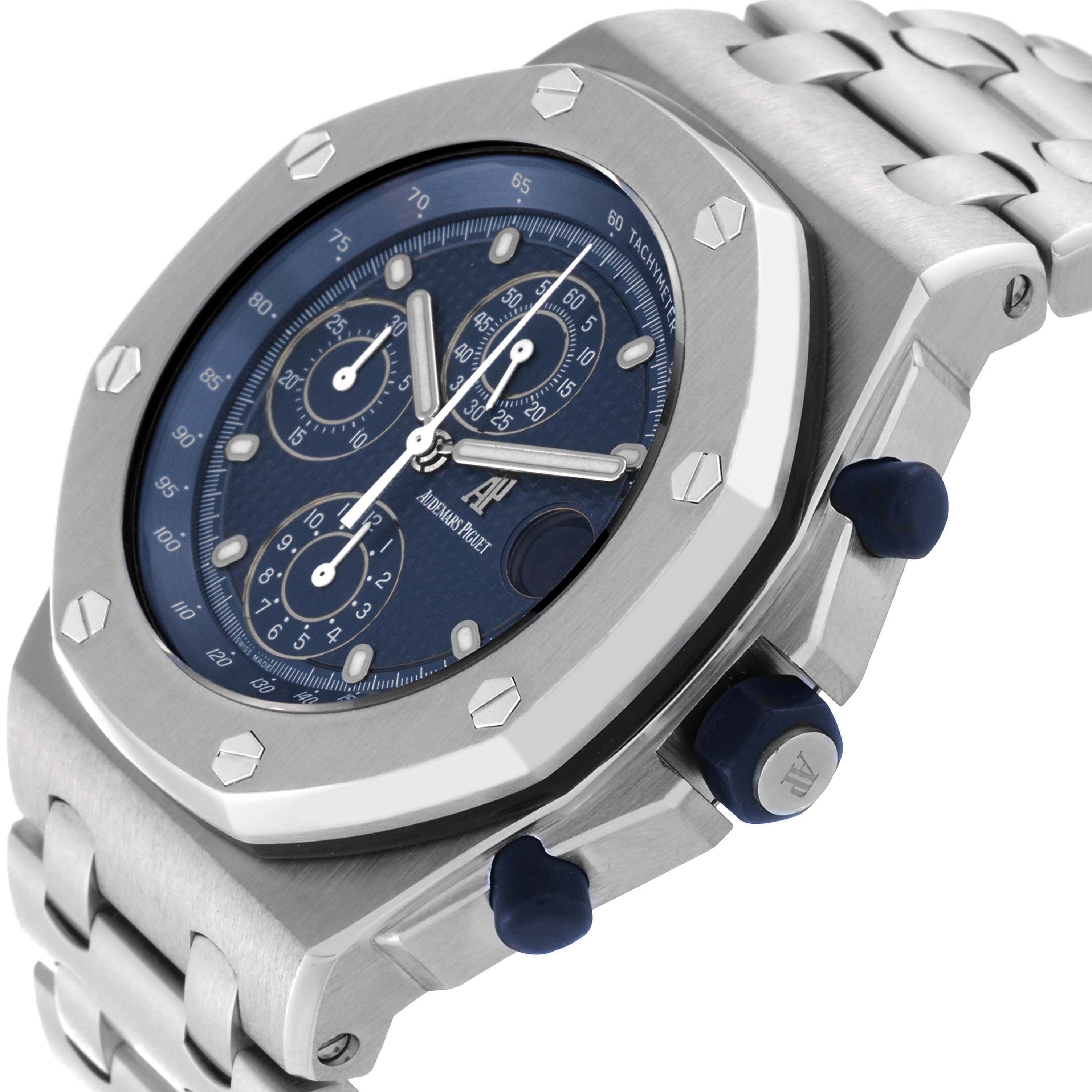 The image shows a side angle of the Audemars Piguet Royal Oak Offshore 25721ST.OO.1000ST.01 Men's Stainless Steel Blue Dial 25721ST.OO.1000ST.01 Men's Stainless Steel Blue Dial watch, highlighting the bezel, dial, and pushers.