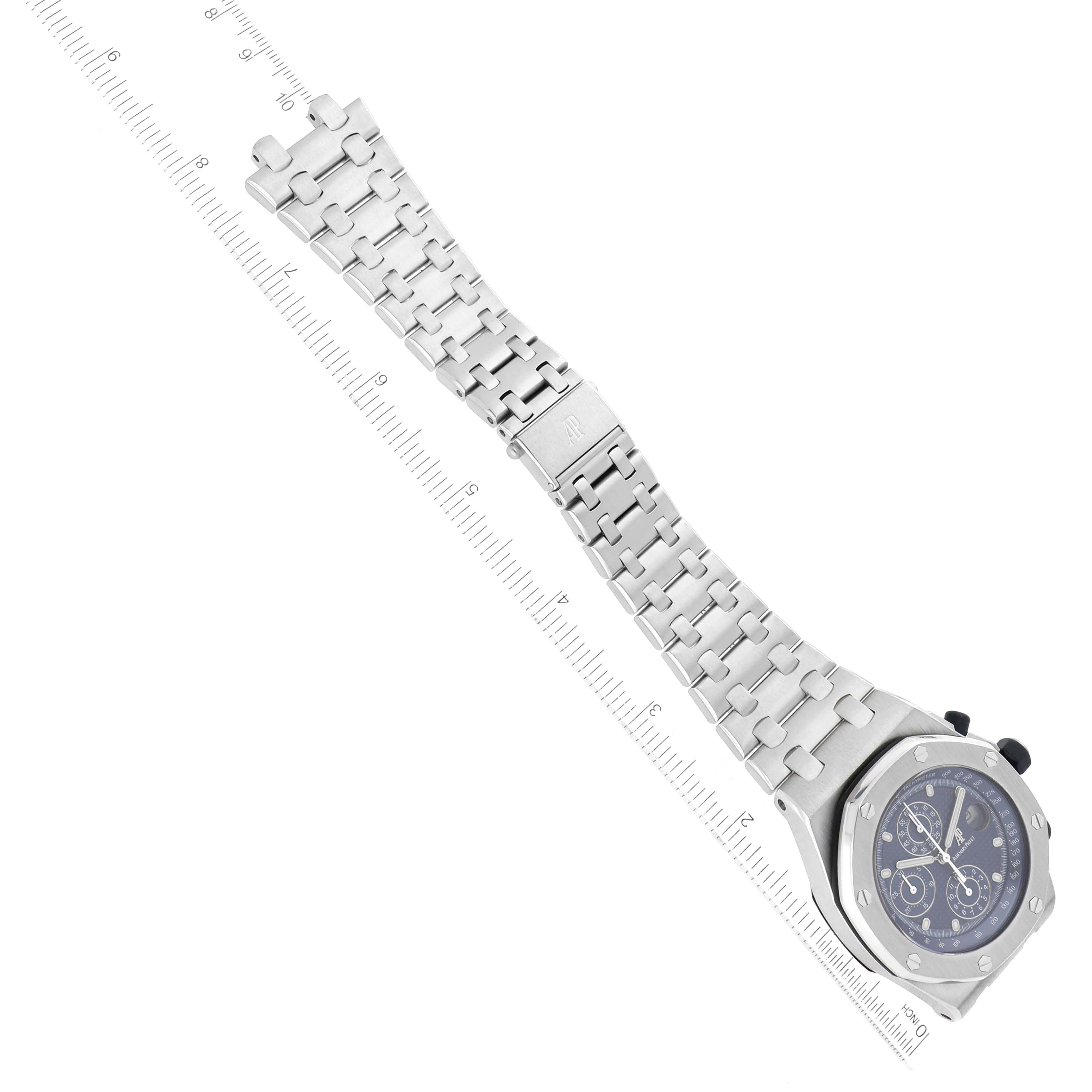 The image shows an Audemars Piguet Royal Oak Offshore 25721ST.OO.1000ST.01 Men's Stainless Steel Blue Dial 25721ST.OO.1000ST.01 Men's Stainless Steel Blue Dial watch at an angled top view, highlighting its strap, bezel, and dial.